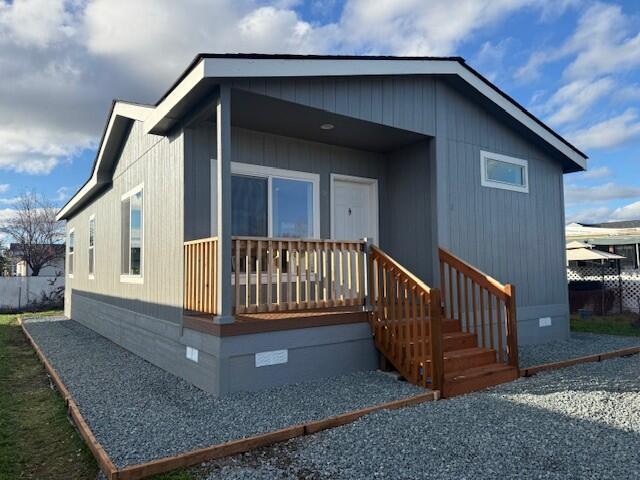 BRAND NEW MANUFACTURED HOME!  This very nice 2 bedroom/2 bath home is located in an all ages park!  There's also an additional room/office space which could be used as a 3rd bedroom.  Home comes with stainless steel appliances. It has a cute little front porch and a nice sized yard in the back.  Won't last!
