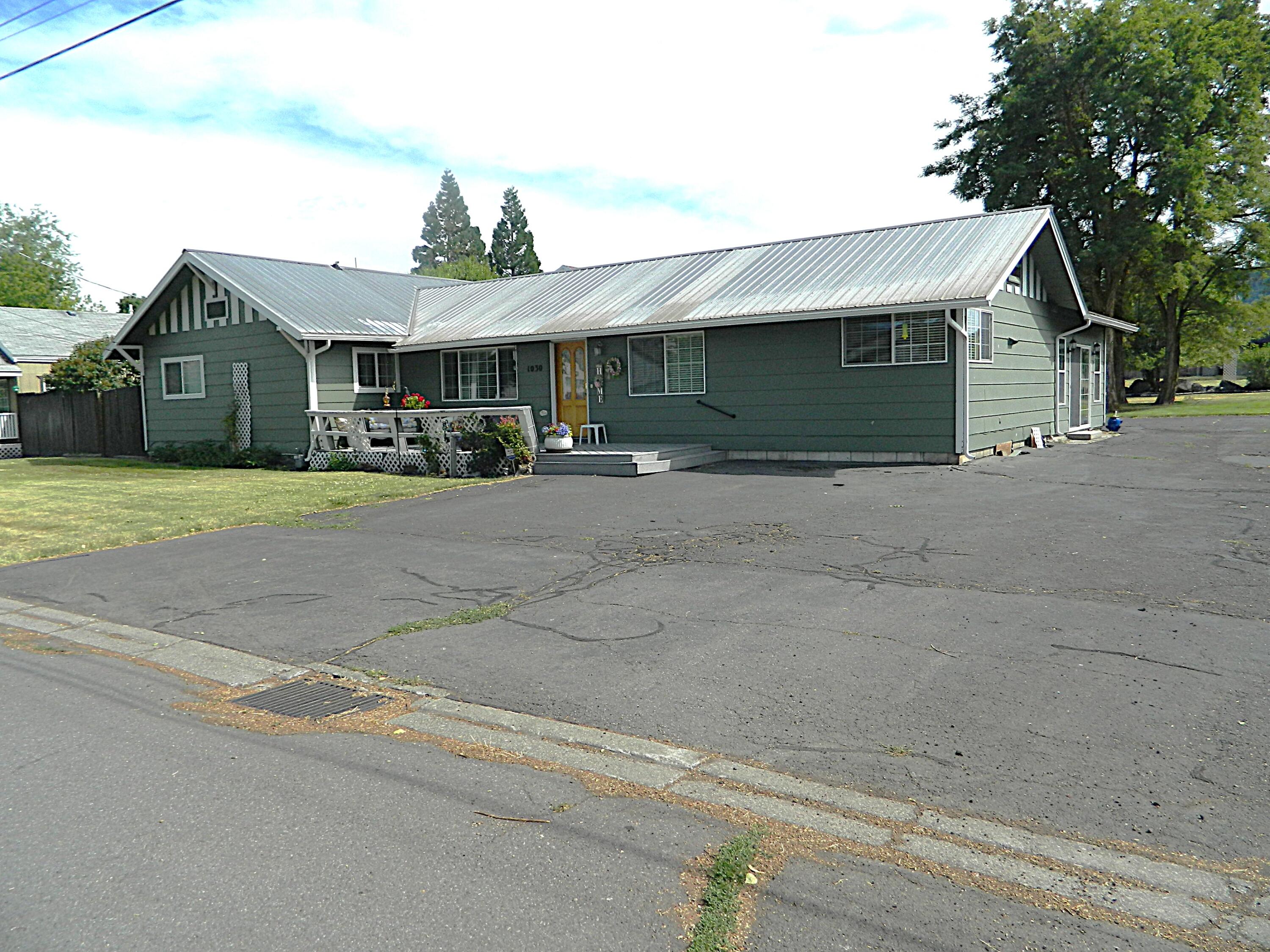 Don't miss out on this rare opportunity on a home with a large shop close to the College and Hospital. It is within walking distance to Harbor Isles. This 2320 sq ft 3 bed 2 bath home sits on .31 acres and has an oversized detached 2 car garage with an RV garage attached to it that is approx 24x42. It has an open floor plan with a large kitchen island. The family room is very spacious with a built-in bar. The kitchen has a pantry and plenty of counter space as well. There is another .47 ac lot adjacent to the property that can be purchased on a separate contract and be given first option to the buyer that writes an accepted offer on the property