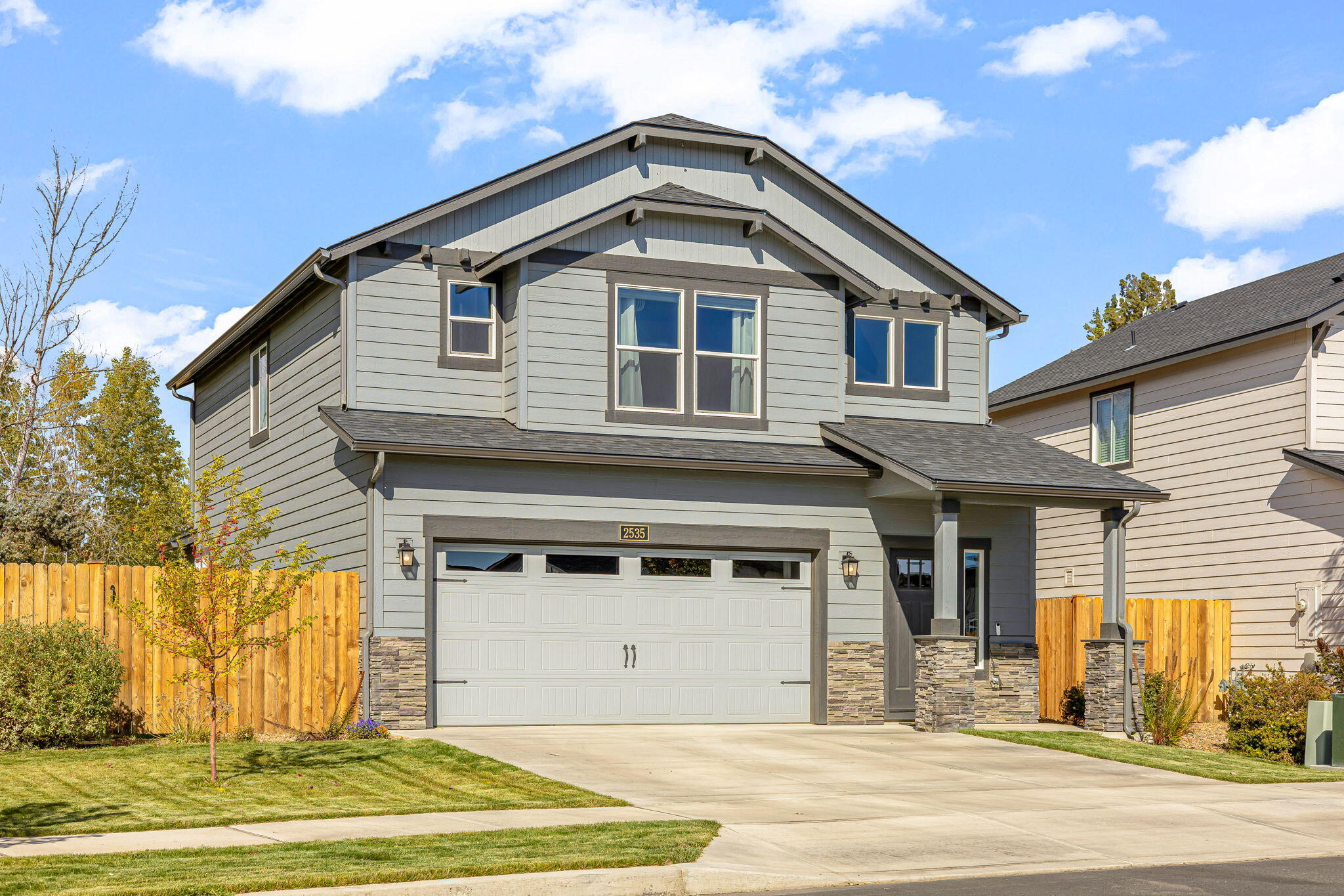 Priced to Sell & Positioned to Impress! This beautifully maintained 2023 home sits on one of Dry Canyon's largest lots (7,405 sq ft), backing to open space for privacy and peaceful views. Inside, the bright open layout seamlessly connects the kitchen, dining, and living areas—perfect for gatherings or everyday comfort. The modern kitchen offers ample counter space and great storage. Upstairs, the spacious primary suite includes a dual-vanity bath and large walk-in closet, while two additional bedrooms share a convenient Jack & Jill bathroom. Central A/C ensures year-round comfort. Outside, enjoy a fully landscaped yard plus pre-installed holiday lighting with customizable themes. Just moments from parks, trails, and all Dry Canyon amenities—this home delivers modern living with an outdoor lifestyle. Don't miss it!