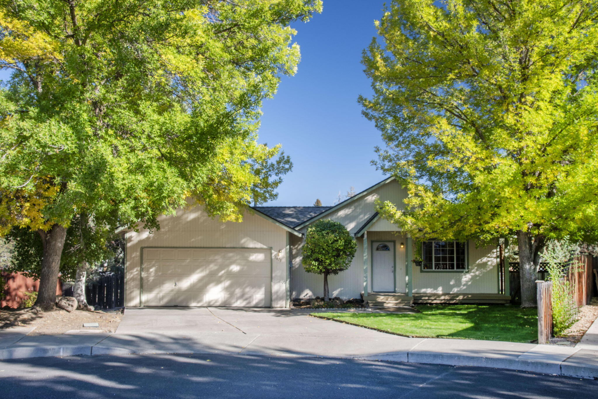 Well-maintained home nestled on a cul-de-sac. Convenient to downtown, the Bend Parkway, the hospital, Hollinshead Park, shopping areas, restaurants. Attractive floor plan, with vaulted ceiling, tile entryway, and an abundance of natural light. The perfect blend of functionality and warmth. The primary suite offers a walk-in closet, vanity with tile backsplash & private shower. An efficient kitchen with pantry includes all appliances, updated flooring, and ample counter space. The dining area has sliding glass doors leading to an elevated 8' x 16' back deck overlooking the manicured lawn and surrounding terrain. Fully fenced and gated yard, with mature trees and underground sprinklers. The large lot may lend itself to an accessory dwelling unit (ADU), which could generate additional income in the future. Updates include a new roof in (2023), water heater (2021) and furnace (2018). New cedar fence (2025). Don't miss this one!