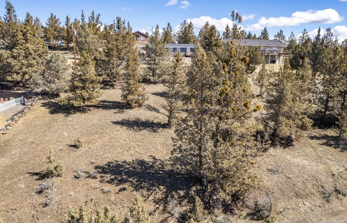 Build your dream getaway just 20 minutes north of Prineville in the scenic Ochoco West community! This .21-acre lot comes with community water, sewer, power access, and garbage service.

Zoned R5 - Rural Residential , with tons of potential. This property provides flexibility for a variety of residential uses, whether you're planing to build now or invest for the future.

Enjoy over 1,200 acres of private land, a fishing lake, pool, horse stables, shooting range, and more. 
Don't miss this rare opportunity for affordable land with unbeatable amenities.