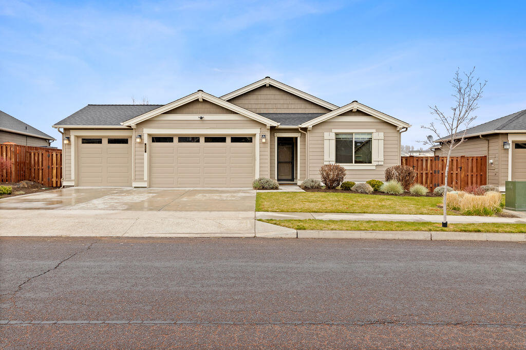 Welcome to Ochoco Pointe! This meticulously crafted 2017 build by Pahlisch Homes offers comfort, style, and convenience. The open floor plan flows well providing space for both relaxation & entertainment. The heart of the home is the gourmet kitchen, with island perfect for meal prep and casual dining. SS appliances add a touch of modern elegance, while abundant cabinetry ensures plenty of storage space for all your culinary needs. After a long day, retire to the tranquil primary suite, complete with a lux ensuite bathroom and walk-in closet. Two extra bedrooms offer versatility for guests, family, or home office.  The triple garage is highly sought after and a must for those extra vehicles.  The HOA maintains front landscaping ensuring effortless curb appeal. Plus with no homes built directly behind, you can relish in the peace and privacy afforded by the wetland preserve.  Not to mention the community pool, park, and access to miles of paved walking trails. Fabulous location!
