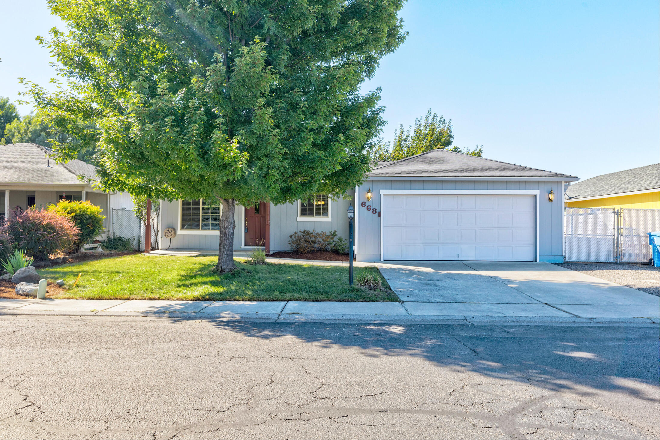 Super clean, three bedroom, two bath, single level, 1121 SqFt, move-in ready home in McLoughlin Meadows Subdivision in beautiful Eagle Point. This home has been very well cared for -newer HVAC system, NEW carpet in bedrooms, sprinkler system in front and back, two car garage,  fresh landscaping and professionally cleaned, ready for you to move right in!  THIS HOME IS IN THE USDA ELIGIBLE LENDING AREA and a stone's throw from Chamberlain Park, conveniently located, close to town, schools and shopping.  Don't let this one slip by! It won't last long!