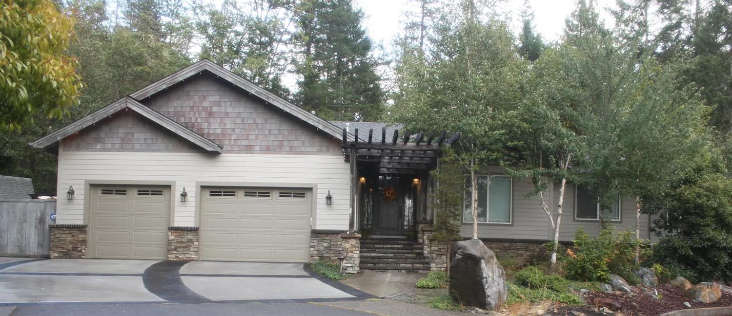 The backyard is like something you'd see at Disneyland. The home is in the city limits but very private! Attached art studio with separate entrance. Large pool with waterfalls, solar panels for pool, built-in fire table, outdoor kitchen, tree house, RV parking, tool shed, access to public trails, BLM surrounds property, oversized garage with lots of storage.
