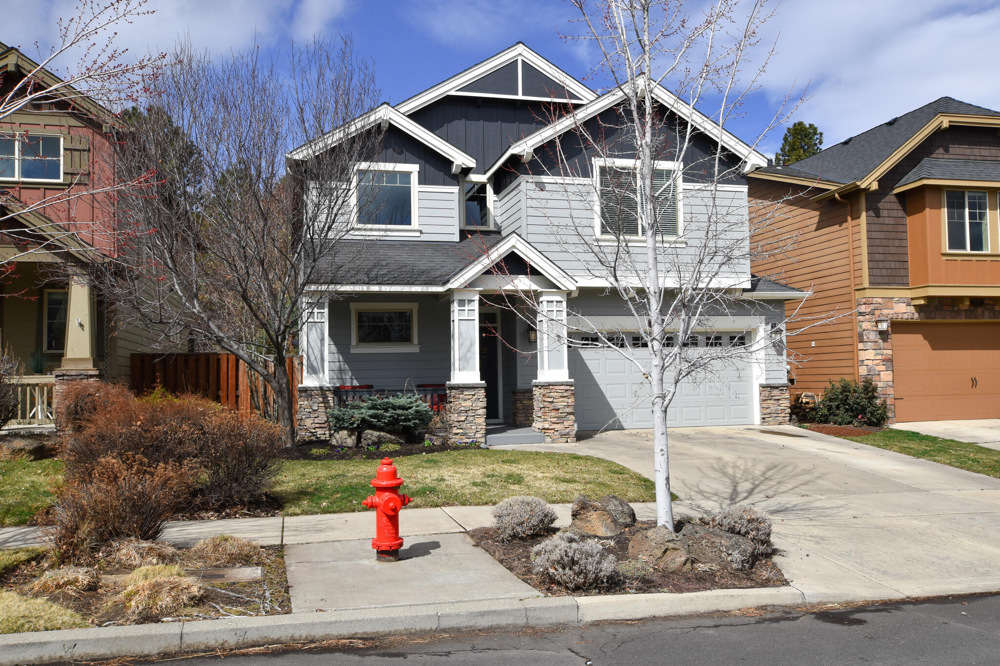 Welcome home! Located in Sun Meadow in SW Bend, you will find this well-maintained home with numerous upgrades and features throughout. Incredibly spacious feel at 1,965 +/- sq ft with 3 bedrooms, 2.5 bathrooms and a large bonus room/office desk included. Downstairs features maple wood floors, dedicated dining area and the great room with custom wood wall and a gas fireplace. The kitchen is bright and open with white cabinetry, stainless appliances, quartz counters and a pantry. Upstairs you will find 2 guest bedrooms, full bath, laundry room, bonus room, and the primary which overlooks the backyard and boasts a tile walk-in shower, double vanity and walk-in closet. You will love relaxing under the pergola in the backyard or around the large gas fireplace! There is even a gate that has direct access to the community park and pool! Additional features include a tankless water heater, AC, custom BBQ area with sink, water feature and new exterior paint in 2021.