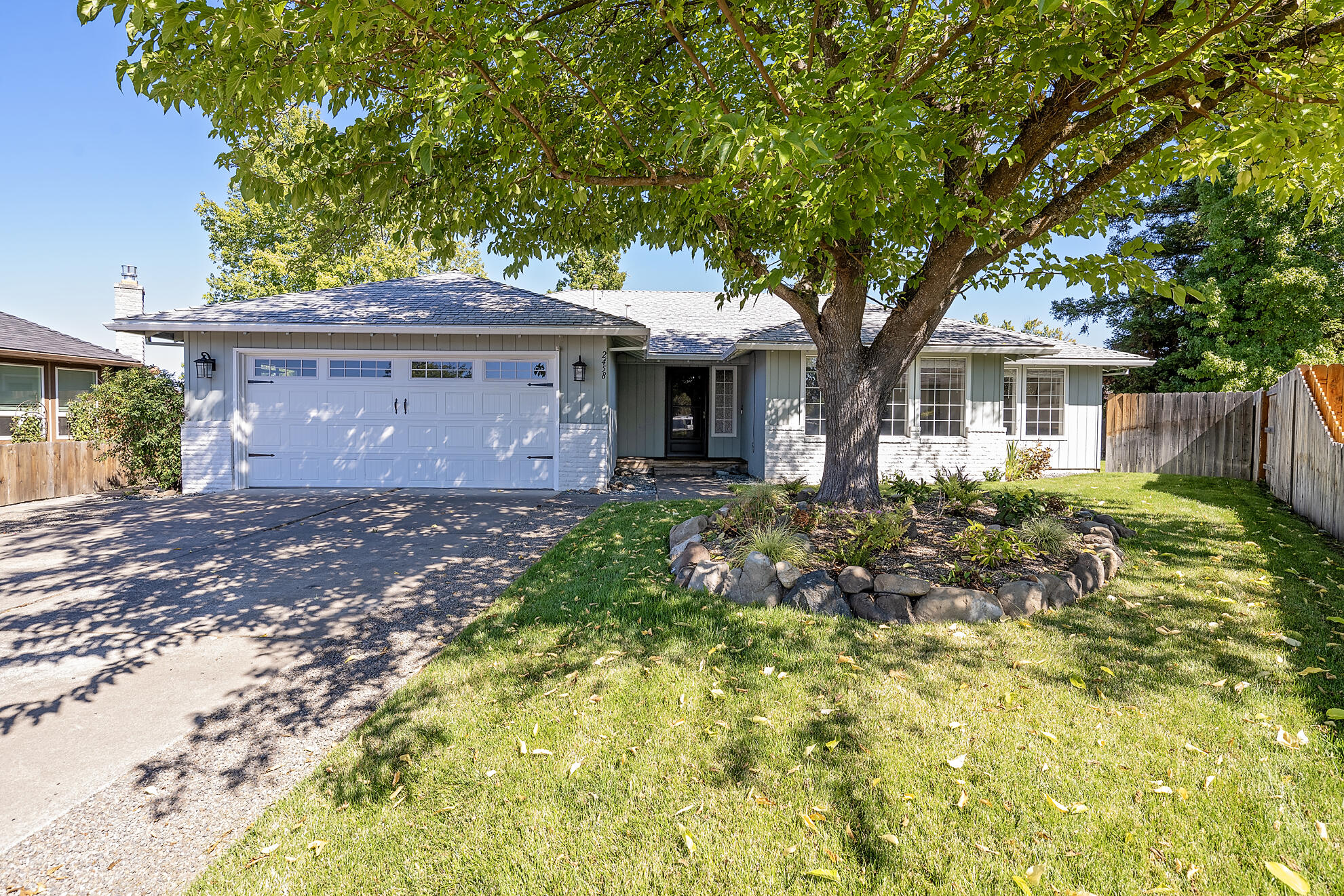 Beautiful East Medford home on a large .28-acre cul-de-sac lot! This 1,991 sq ft home features a great floor plan with formal living, dining, and entry, plus a separate family room with cozy fireplace. The kitchen offers a breakfast nook and great flow for entertaining. Three spacious bedrooms each include walk-in closets, and both bathrooms are full size. Outside you can enjoy a large covered deck, expansive yard, and a fantastic 16'x20' detached finished shed with power and mini split, perfect for hobbies! A must-see home that combines comfort, space, and functionality in a wonderful neighborhood!