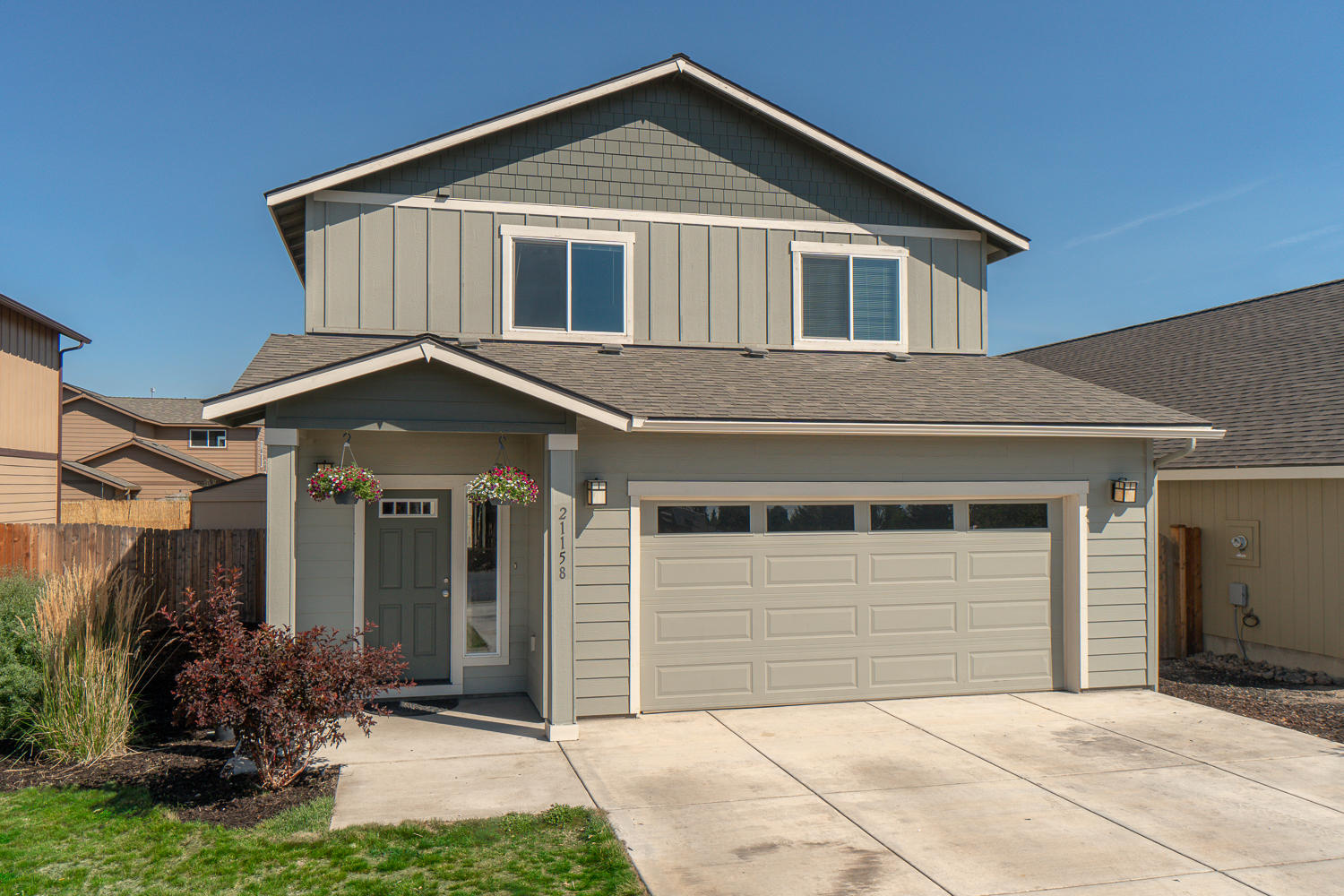 Quick close possible on this conveniently located & turn key home in SE Bend. Great room plan w/plenty of space to entertain inside & out! Spacious living area w/corner gas burning fireplace. Open kitchen w/slab Granite counters, central island w/bar seating & SS appliances. 5 burner gas range w/microhood, SS refrigerator & corner pantry. Laminate wood look flooring throughout the main living space for easy maintenance. Sliding door off the dining area opens to a covered back patio for year round enjoyment. Vaulted Master Ste is upstairs & features a walk in closet, step in shower & dual vanities. Additional bedrooms are oversized, one w/walk in closet. Laundry is situated in the upstairs hall & washer & dryer is included. Gas forced air, A/C, dbl garage & RV parking - low maintenance landscape & a storage shed too! Auto sprinklers, established landscaping & fully fenced for pets & family. Don't miss this one. Open House this Saturday 11-2 or call for a private showing!