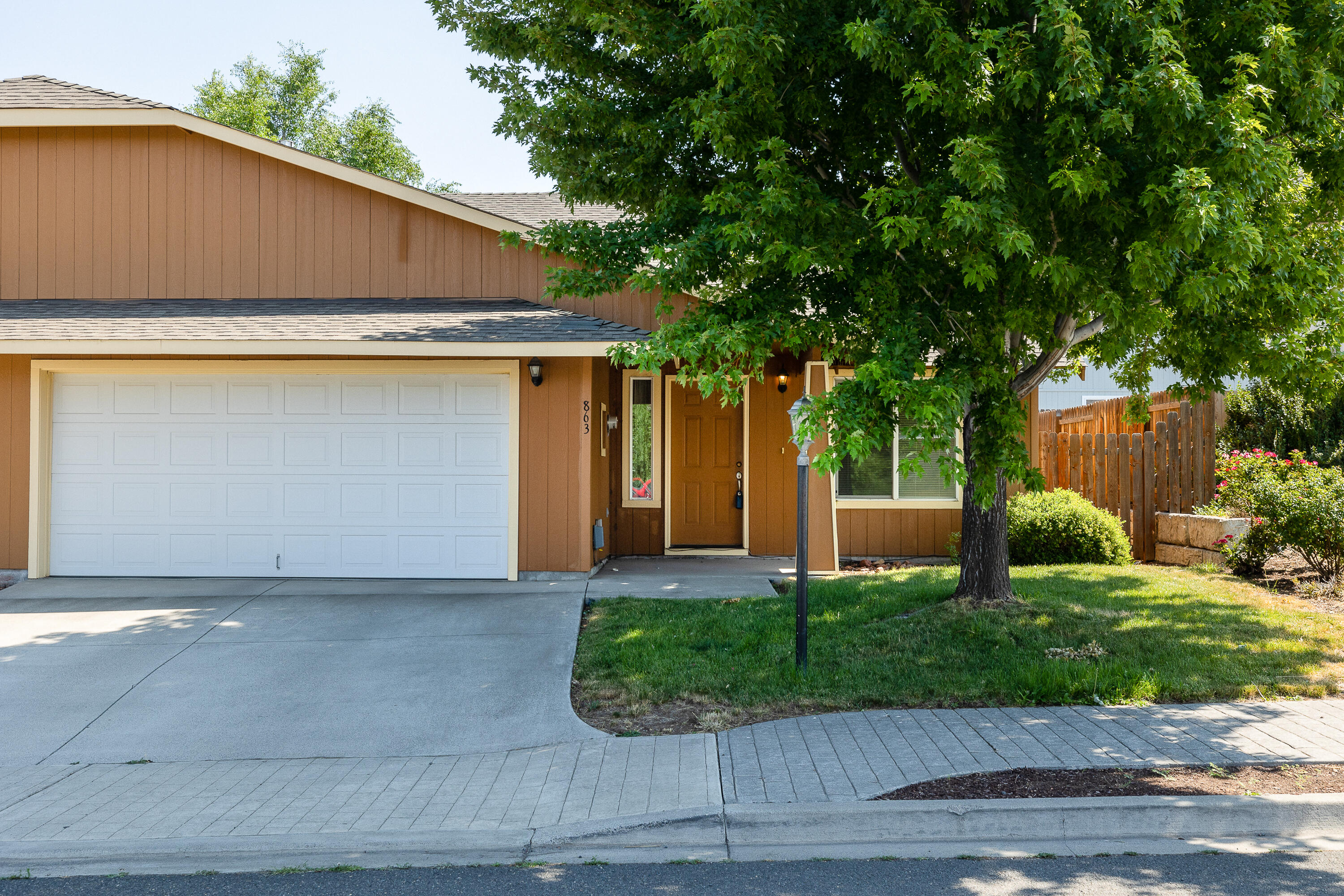 Beautiful single story home with vaulted ceilings in the living room and kitchen, open floorplan, private fenced backyard with storage shed. This home has central A/C and pride of ownership.