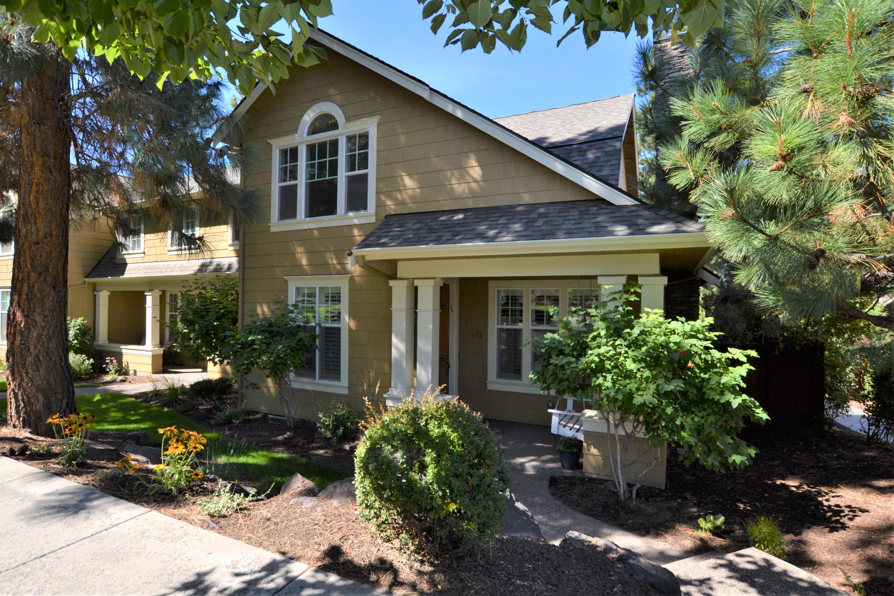 Welcome to Northwest Crossing. This well appointed end unit townhouse faces Lewis and Clark Park and is just blocks away from restaurants, schools and shopping. This one owner home is incredibly spacious at 1,970 +/- sq ft and features 3.5 inch plantation shutters throughout. On the first floor you will find the comfortable living room with gas fireplace and soaring vaulted ceiling. The kitchen highlights stainless appliances, granite tile counters, center island with breakfast bar and a large pantry. Enjoy having the master on the main with walk-in closet, double vanity, soaking tub and separate showing. There is also a spacious dining area, laundry room and half bath plus an over size 2 car garage with alley access. Upstairs there is a loft area, 2 guest bedrooms and full bath. The private side yard highlights newly installed sod, garden area and spacious patio. Stay comfortable year round with natural gas forced air & AC. New roof & exterior paint in 2019. Your next home awaits!