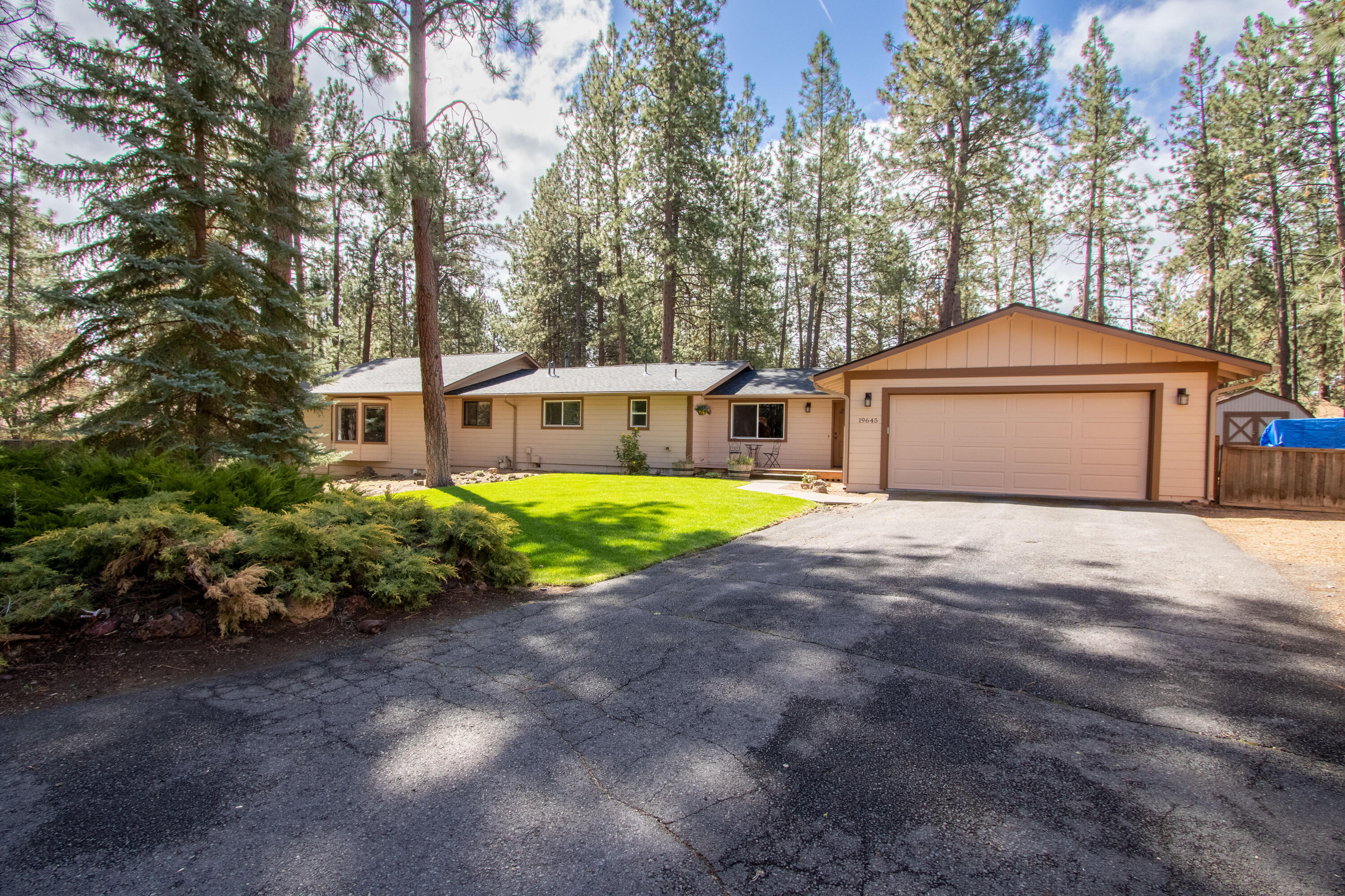Are you tired of living in a place where your neighbor's home is just an arm-length away (or at least it feels that way)? This is the perfect home for you. Tucked away on a quiet neighborhood cul-de-sac, this 2400-square-foot home, sitting on a half acre, is the perfect spot to find peace in southwest Bend. This home has been incredibly maintained throughout the years including an updated kitchen and new garage built in 2021. The side yard features gated parking, perfect for a boat or RV, while the rest of the lot features plenty of green space for outdoor entertaining.