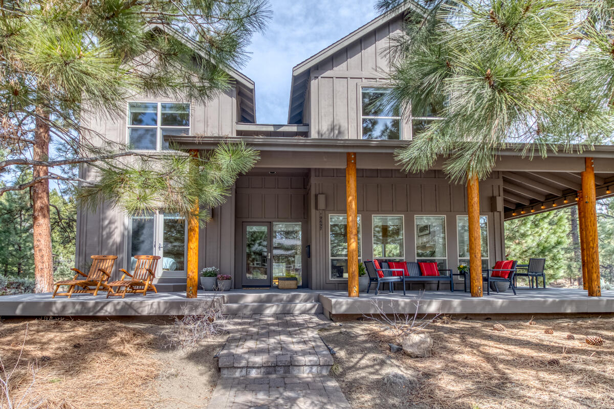 Whether you're looking for a primary home, family retreat, 1031 exchange, or premier vacation rental (STR), RiverWild at Mt Bachelor Village is the perfect option. This meticulously maintained, fully furnished home features 3 bedrooms and 2.5 bathrooms, with the primary suite conveniently located on the main floor and two additional bedrooms upstairs. Enjoy the inviting wrap-around porch, perfect for watching resident deer, or relax in the cozy great room with a charming gas fireplace and vaulted ceilings, complemented by large windows that fill the space with natural light. Enjoy the amenities including clubhouse, pool and hot tub conveniently located right outside your front door. The Deschutes River Trail is just moments away, and the property is close to Historic Downtown Bend, Old Mill District, and the road to Mt Bachelor Ski & Snowboard Resort. Experience the best of Bend, whether as an investment opportunity with short-term rental potential or as your own tranquil retreat.