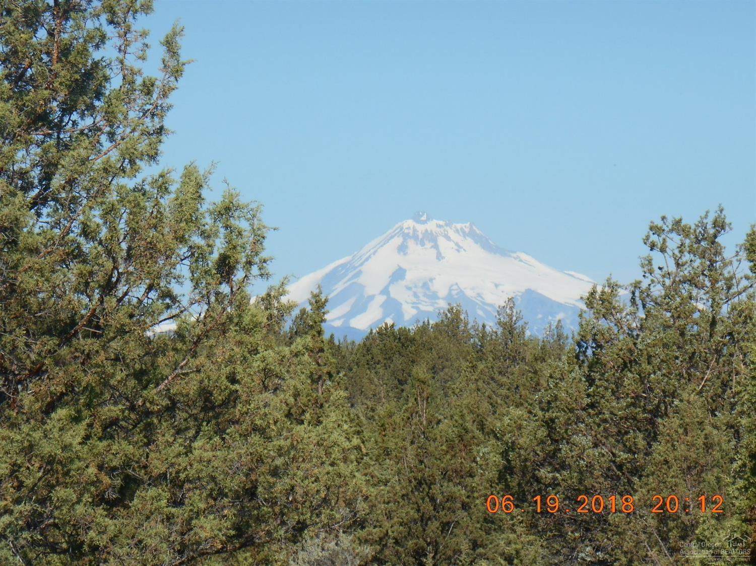 Wow! 2 acres. Cascade Mountain views. Paved roads on South and East of lot. Very close to Lake Billy Chinook and Lake Simtutis. About 6 miles to Madras. If you want peace and quiet and unbeatable views, this is the property for you.