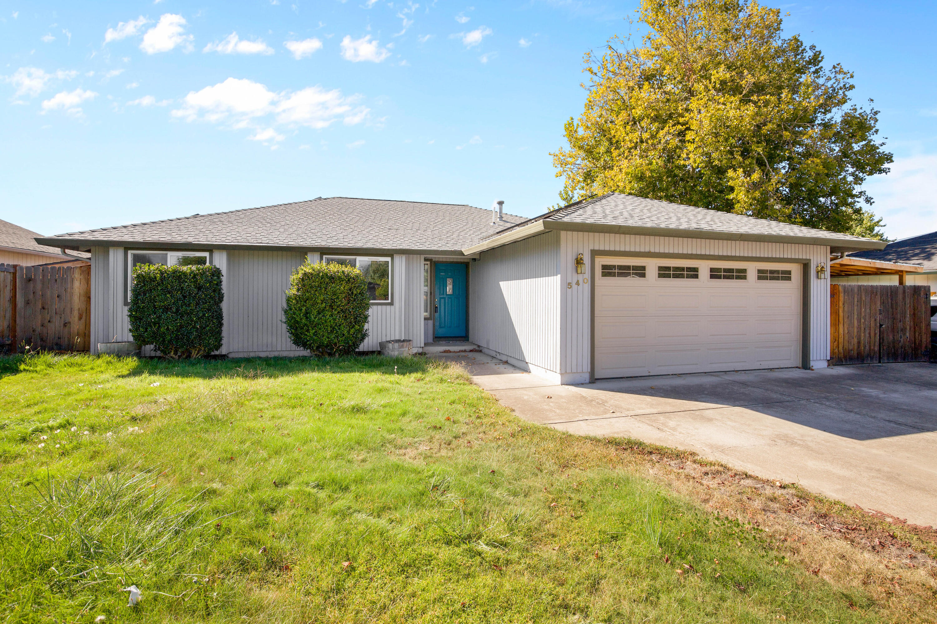 Inviting 3 bedroom, 2 bath home in West Medford! Hardwood floors and vaulted ceilings create a spacious feel, while the primary suite includes its own walk-in closet. The backyard is designed for both play and purpose with space for an above ground pool and small garden, plus a covered patio for entertaining. With solar power, RV parking, and a garage set up with storage, this home is move-in ready. Conveniently near schools, restaurants, and shopping.