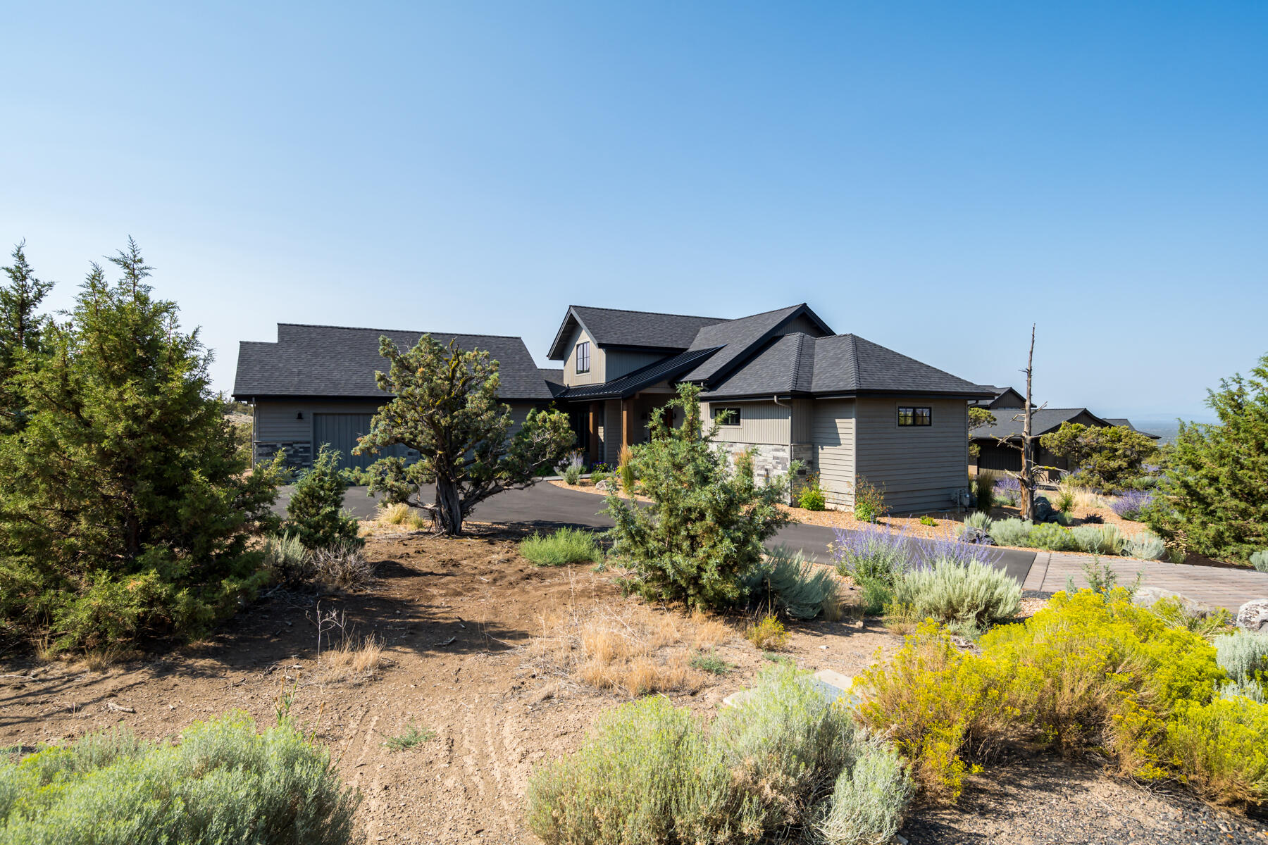 Refined Resort Living. Step into this two-story Northwest-style home at Brasada Ranch and feel the calm (the color palette is exceptional). High ceilings & wide-plank hardwood floors surround the great room and open plan kitchen. Stunning AGA Mercury range is a focal point behind an expansive island w/farmers sink, under-counter wine cooler & dishwasher. Dining area and impressive pantry. Main floor primary suite w/huge bath featuring large shower & soaking tub. Walk-in closet has all the built-ins you desire. 3 bright guest rooms (1 is currently a wonderful private office). Laundry room. Earth Advantage Home, ENERGY STAR windows & equipment. 2-car garage w/epoxy floors. Covered deck w/heat, lighting & contemporary gas fire pit. Enjoy all the benefits of a gated resort community's amenities: athletic center, 3 pools, world-class equestrian center, 18-Hole championship golf course, spa, restaurants, hiking, biking, fishing & much more! Enjoy this tranquil oasis in the high desert.