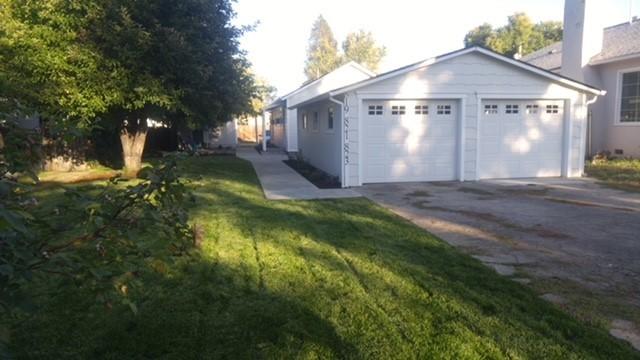 Great money maker! 3 units! A duplex with single car garages and a single home with off street parking and convenient alley access.  Easy access to shopping, schools, bus route and south interchange freeway access. Newer, cozy duplex units.  Updated and well maintained single home.  Nicely landscaped yard with sprinkler system.  Laundry facilities for all units in the garage.  2 car garage  with single spaces and garage door opener for each duplex tenant.  Great rents and all units are rented .