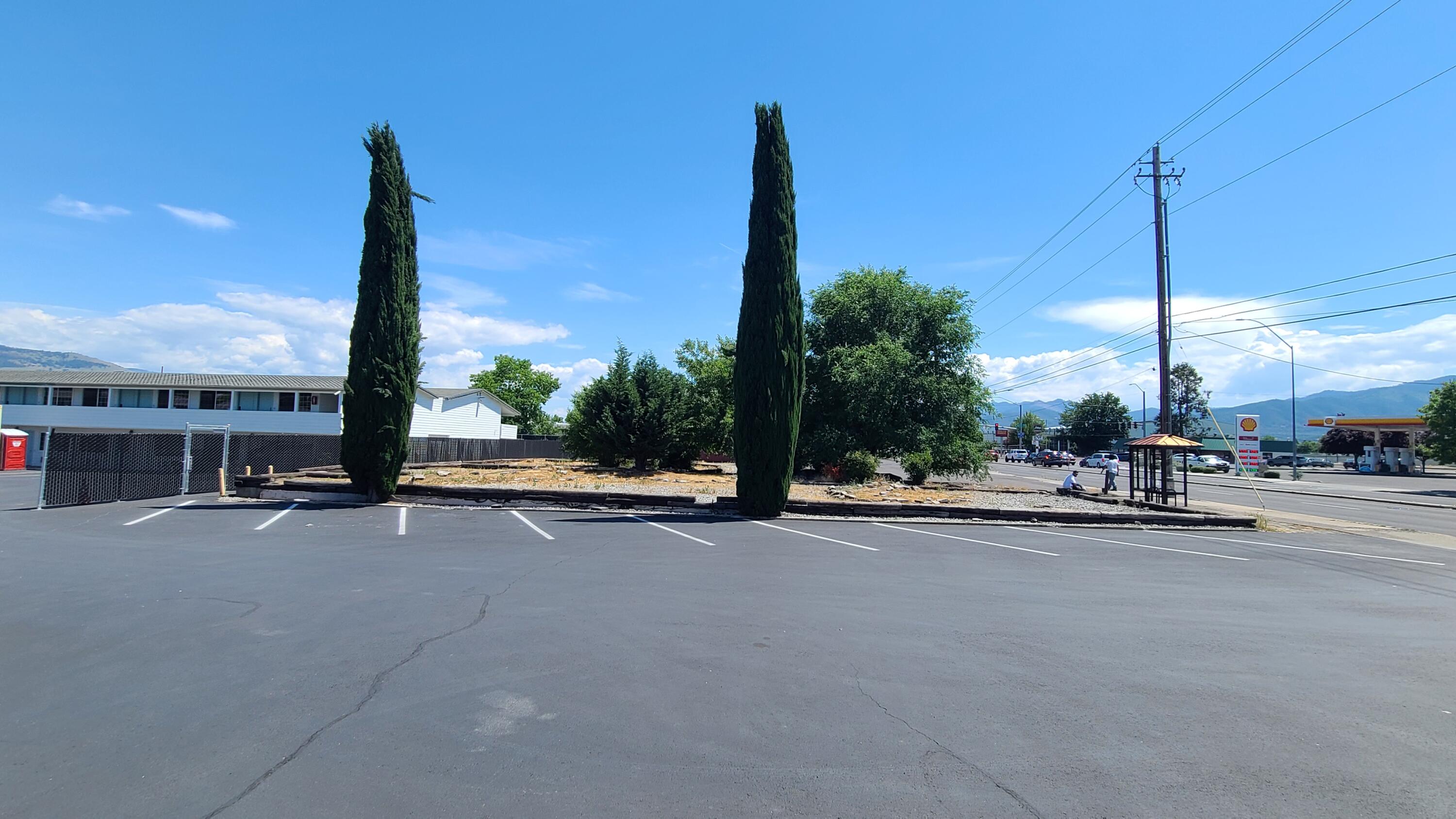 Located in South Medford's regional commercial district near one of the only two Interstate 5 exits in Medford and the bustling south commercial district, this 0.43 acre lot is located next to a Burger King and the intersection of Medford's main north and south artery AND the east and west artery of South Medford. The zoning is C-R, Commercial Regional with a large amount of new development nearby. Very high visibility, especially by those drivers at the Barnett and Highway 99 stoplight. Medford's central downtown is just up the street. Seller carry option with only 20% down. The property is available for lease as well.