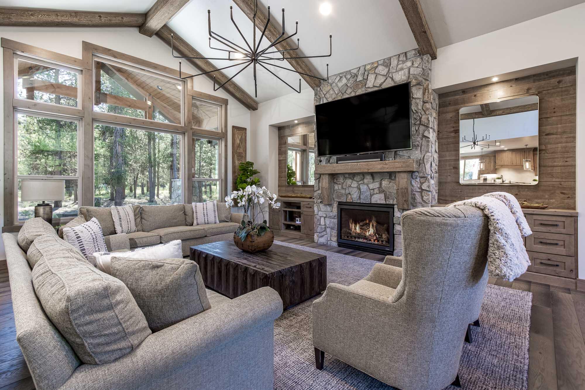 Spectacular eastern-facing home in Caldera Springs! Quality craftsmanship throughout and a fantastic floor plan provide everyone with the space they need. There are three on suites on main level along with great room, gourmet kitchen, laundry/mud room. Upstairs find three more suites, + bunk/bonus room. Expansive paver patio with hot tub for relaxing or entertaining. Enjoy the forested green belt off the back patio. Designed to bring family and friends together. Enjoy paddling and fishing the lakes, walking along the trails, or gathering around the fire pit to share stories and memories. Caldera Springs offers all the amenities for your family to relax, rejuvenate and reconnect. Sold Furnished. Contact your agent to preview today.