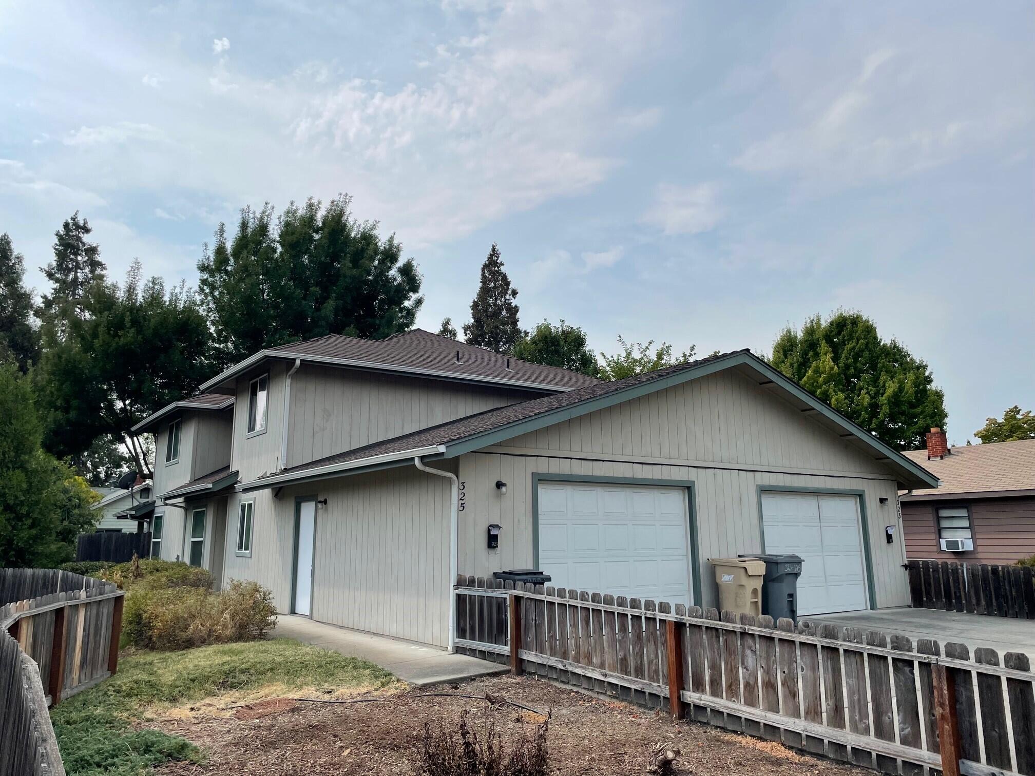 Fantastic investment property in the heart of Grants Pass. Two clean, 2 bedroom, 1 and a half baths units with one car garages. These are very spacious rentals with each just under 1,300 square feet per side. Long term tenants paying 1,000 per month and increasing to $1,100 January 1, 2022.