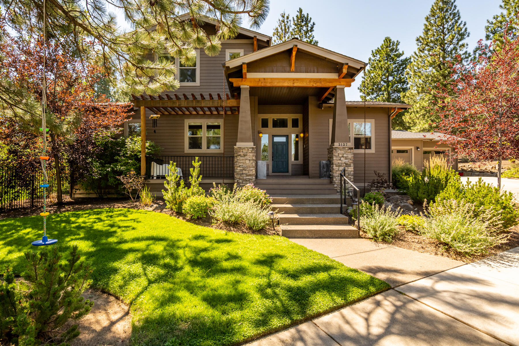 Stunning custom home constructed by award winning builder Greg Welch and located within the coveted Shevlin Ridge subdivision. Screened by mature trees, this home enjoys an enhanced sense of privacy, taking full advantage of the large .39 acre lot. Streaming natural light through south facing windows floods the great room, kitchen and dining. The well appointed kitchen is anchored by a large island with seating for six, two pantries, stainless appliances and tiled backsplashes. The main level also includes a private office, spacious laundry room and a primary suite with dual vanity, jetted tub & luxury shower. Second level features an expansive bonus room, three bedrooms and a dual vanity bath. Enjoy year-round outdoor living on the large covered decks overlooking the beautifully landscaped, fully fenced backyard, creating a park like setting. Shevlin, Compass and Discovery parks are all within striking distance, not to mention fine dining, shopping and schools.