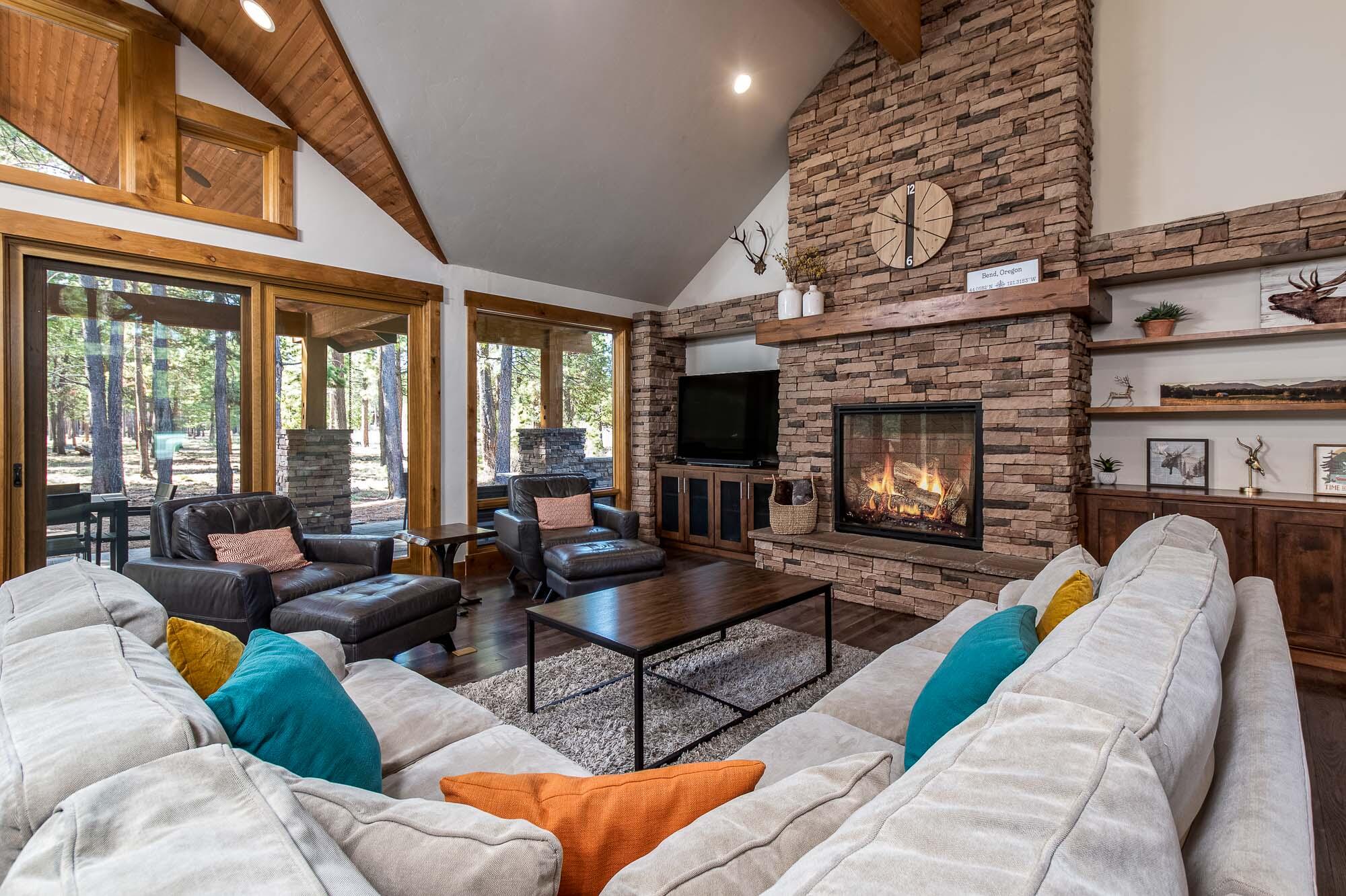 Welcome home to your exceptional vacation retreat in Caldera Springs. Luxurious finishes and a fantastic floor plan provide everyone with the space they need. Two on-suite primary bedrooms on the main level along with a great room, gourmet kitchen, mud/laundry room, half bath and covered paver patio with hot tub, built-in BBQ, and fire pit. Upstairs you will find three more bedrooms, an entertainment loft, a stacked laundry machine, and a deck for relaxing. This eastern-facing home overlooks the nature trail to the headwaters of the Fireglass, Trailmere, and Obsidian Lakes. Sold furnished with many little extra features like a Tesla charging station, dry bar with wine refrigerator, Sonos surround sound, and many more to name. The large three-car garage with one bay lock-off is perfect for storing all your gear for four seasons of fun! Whether you are looking for a full-time residence, an investment property, or a vacation home, this is your opportunity for a Sunriver adventure.