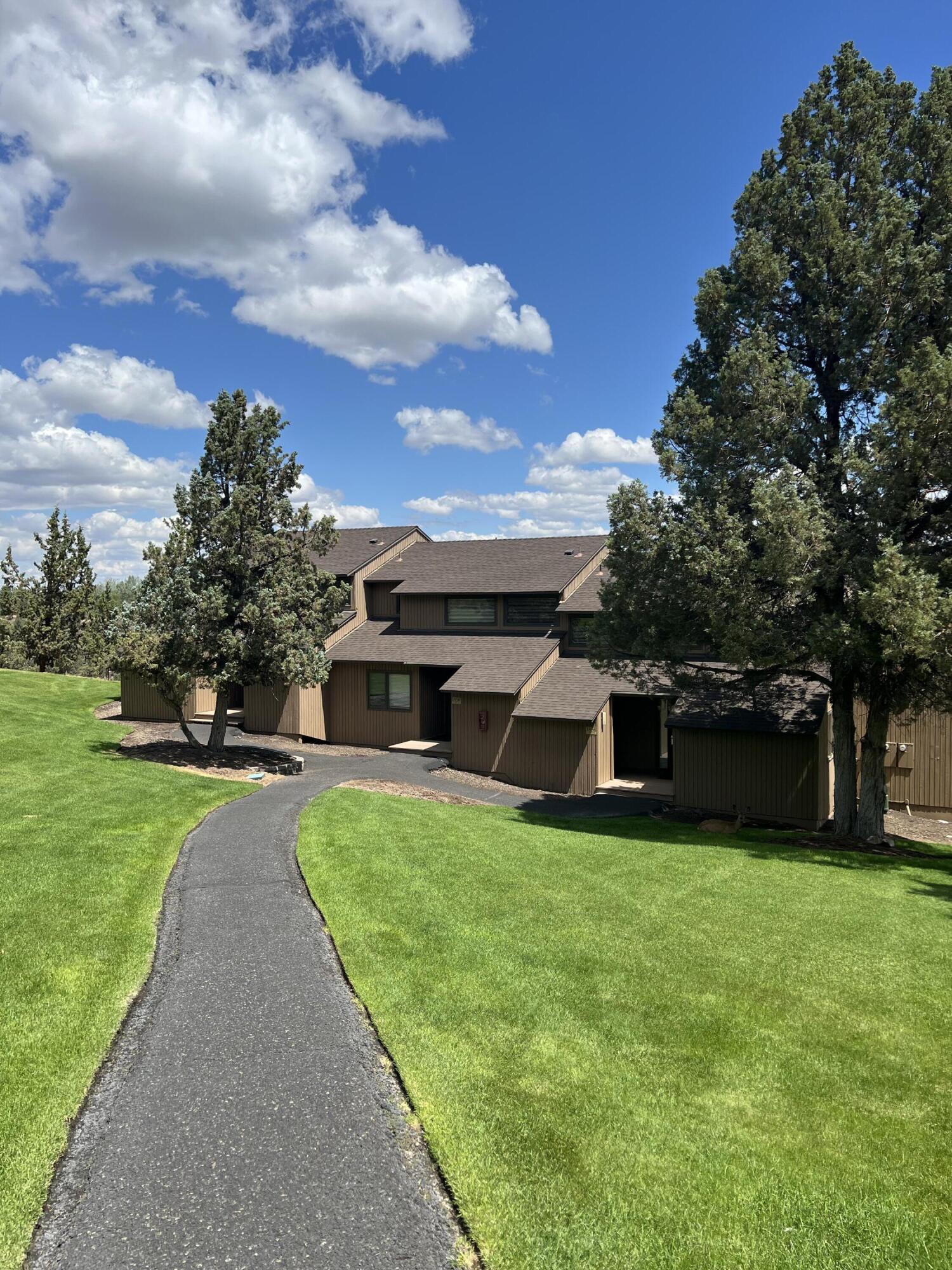 Discover this charming two-bedroom, two-bathroom home that offers the perfect blend of privacy and natural beauty. Tucked away from the main road, this 1,168 square foot residence provides a peaceful retreat while maintaining easy access to all that Eagle Crest Resort & Central Oregon has to offer.

The home's thoughtful layout places one bedroom conveniently on the first level, while the primary bedroom occupies the second floor, creating an ideal separation of spaces. The primary suite features delightful views of Smith Rock & the Deschutes River feel like a mini vacation. 

This property combines the tranquility of a secluded location with the convenience of modern living. The open lawn areas and river views create an outdoor enthusiast's dream, while the well-designed interior ensures comfort in every season. Here's your opportunity to own a slice of Oregon paradise where privacy meets natural beauty in perfect harmony. Stay 10/21-11/14 every year and enjoy the Fall Beauty!