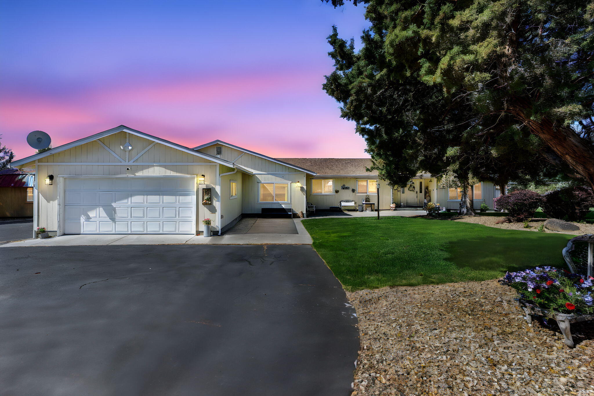 Discover a stunning single-level 3-bedroom, 2-bath residence in Madras Ranchos. This 2,399 sq ft home sits on a 2.10-acre corner lot and seamlessly combines charm with modern amenities. The expansive great room features laminate wood flooring, an efficient pellet stove, and oversized windows with a sliding glass door opening to a covered deck. A versatile bonus flex room can serve as a family room or primary suite. The brand-new kitchen boasts custom cabinets and fully remodeled countertops, perfect for culinary enthusiasts. Additional highlights include forced-air heating, central A/C, an attached two-car garage, underground sprinklers, two storage sheds, and a
wrap-around gravel and asphalt driveway with ample RV parking. Experience comfort, functionality and refined style—schedule your exclusive showing today.