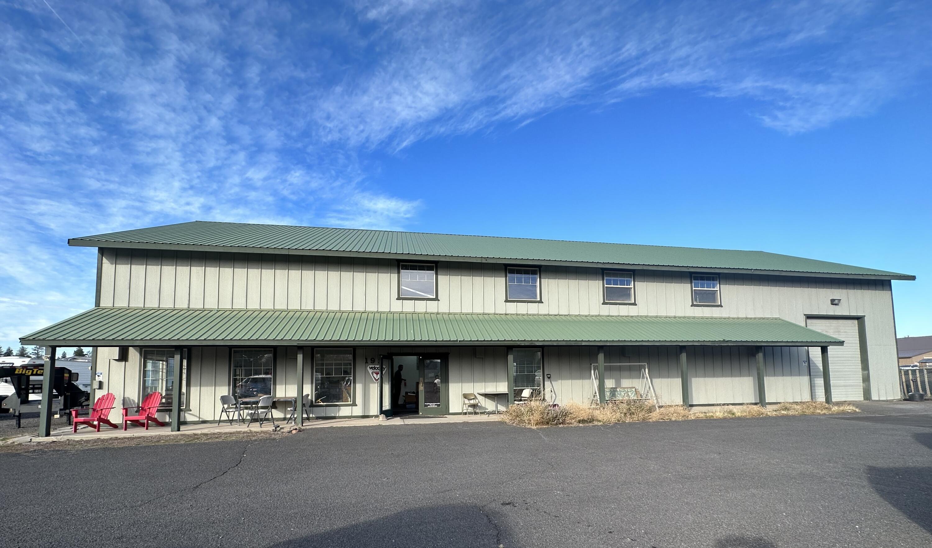 Major price reduction! Excellent investment opportunity situated on a large .53-acre light industrial lot. 
Key Features: Spacious 6,000 sq ft building, 18' vaulted ceilings, 1.5 bath, efficient heat pump, 400 amp service, ample parking. 
PRELIMINARY DRAWINGS PROVIDED FOR A 4500 SQFT ADDITIONAL BUILDING:  (3) 1500 sq ft office/ warehouse rentals. Located in a high-traffic area ensuring visibility and accessibility. Schedule a viewing today!