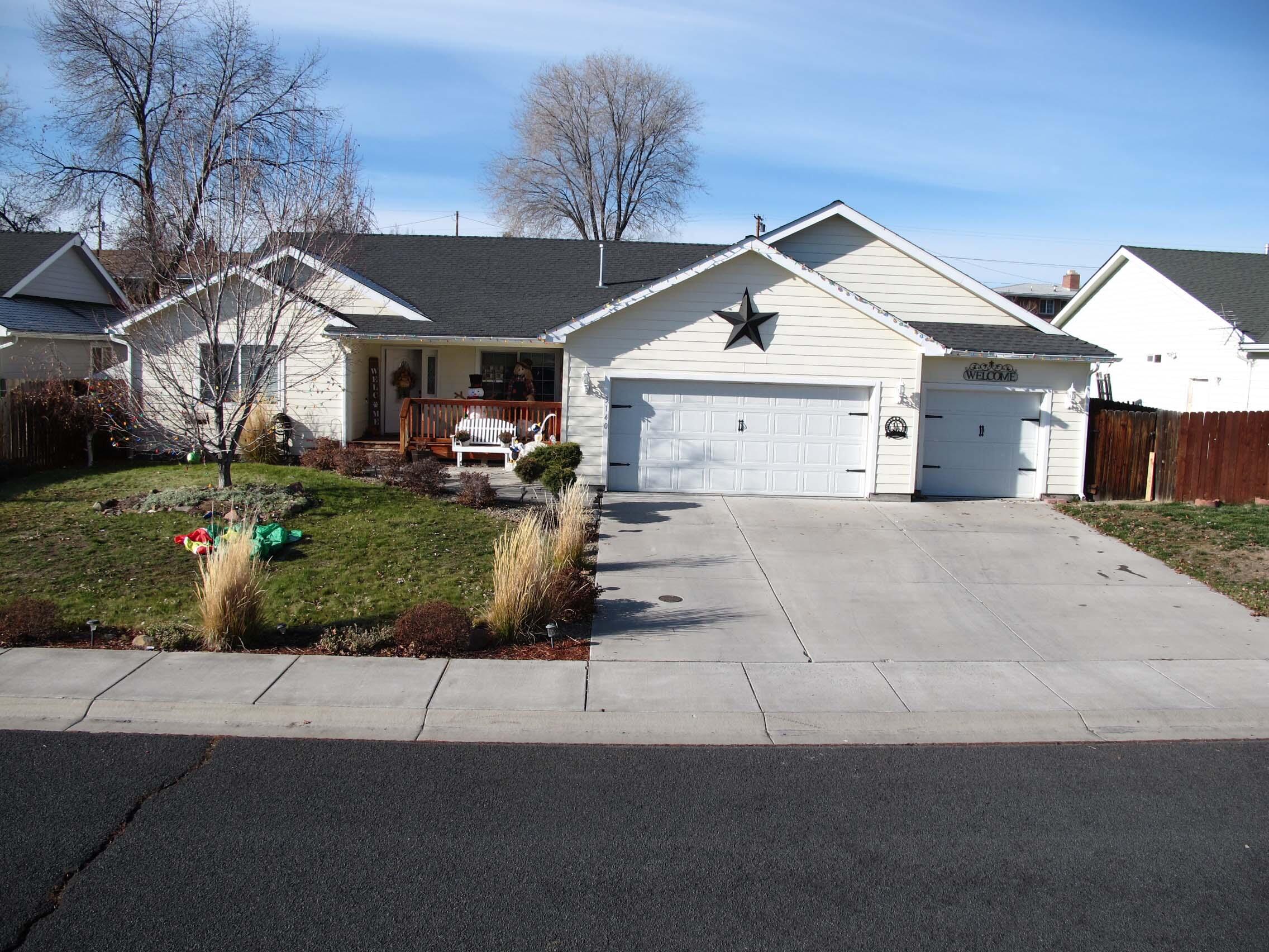 Great neighborhood
This 4 bedroom home has over 1900 sq ft of living space and a 3 car garage. It was quality built in 2006. There is gas central heat and fireplace and air conditioning. The open, and spacious floor plan with vaulted ceilings make this home feel even larger and there is an office/ den off the living room. The primary bedroom with on suite bath and walking closet are on one side of the house and the other 3 bedrooms are on the other side. The back yard is fully fenced with a nice, covered patio for BBQing and entertaining or just relaxing after a hard day at work. This is a home you will not want to miss. Call for a private showing before its gone.