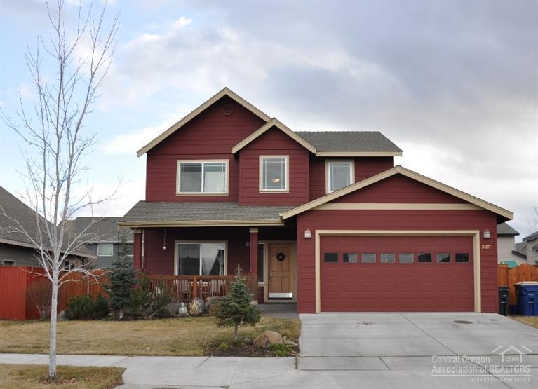 Close to park and canal trail, home features open floor plan, slate entry, gleaming hardwood floors throughout main. Kitchen includes tile counter tops/back splash, and butler's pantry. Gas fireplace in great room. Stone pavers accent patio, and fenced yard includes fruit trees, perennial garden, and sprinkler system. Master has walk-in closet, garden tub, tile floors/counters. Loft upstairs can serve as bonus room or home office. Home used lightly by these original owners as second residence until 2013.