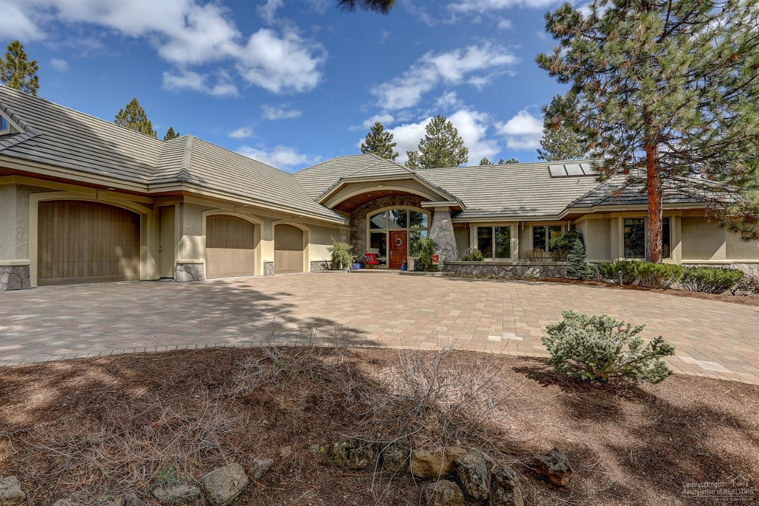 One of the finest homes you'll experience in Central Oregon. Gorgeous single-level on 2 aces in desirable Sunset View Estates. Tranquil wooded setting with Cascade mountain views to west and golf course views to the east. Complete interior remodel in 2016 with additional updating in the past two years including new dishwasher, microwave, paint, Nuvo sound system, window coverings, and light fixtures. Over $100K in improvements to outside spaces and landscaping, including expanded decking, built-in BBQ island/fridge, jacuzzi spa, ext lighting and dozens of trees planted.