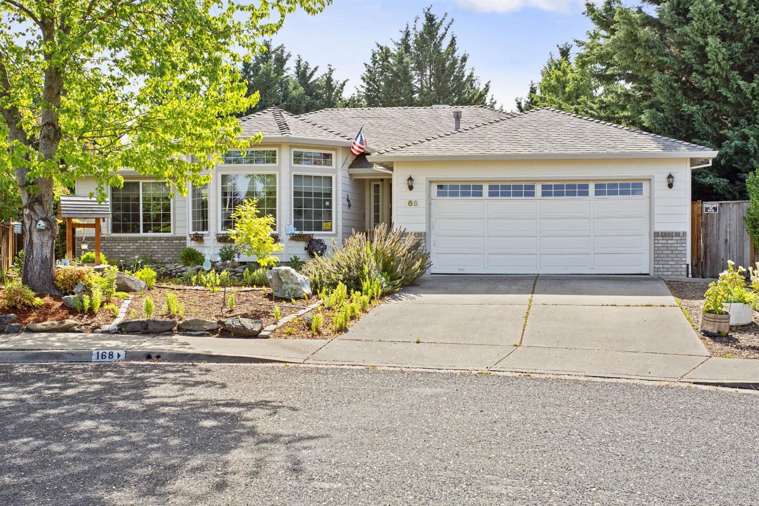 Enjoy this 2028 sq ft home on a .49 acre lot, located in the Phoenix Hill Development. New laminate 12mm flooring throughout the house, tile in baths and laundry room. Large bay windows in the living room, formal dining, and a large kitchen with eating bar and breakfast nook. Kitchen opens to a large family room with a gas fireplace. Home has 3 bedrooms, 2 baths, gas heat, extended patio with a pergola, wonderful gazebo to enjoy the beautiful backyard, and drought resistant landscaping in front and backyard.