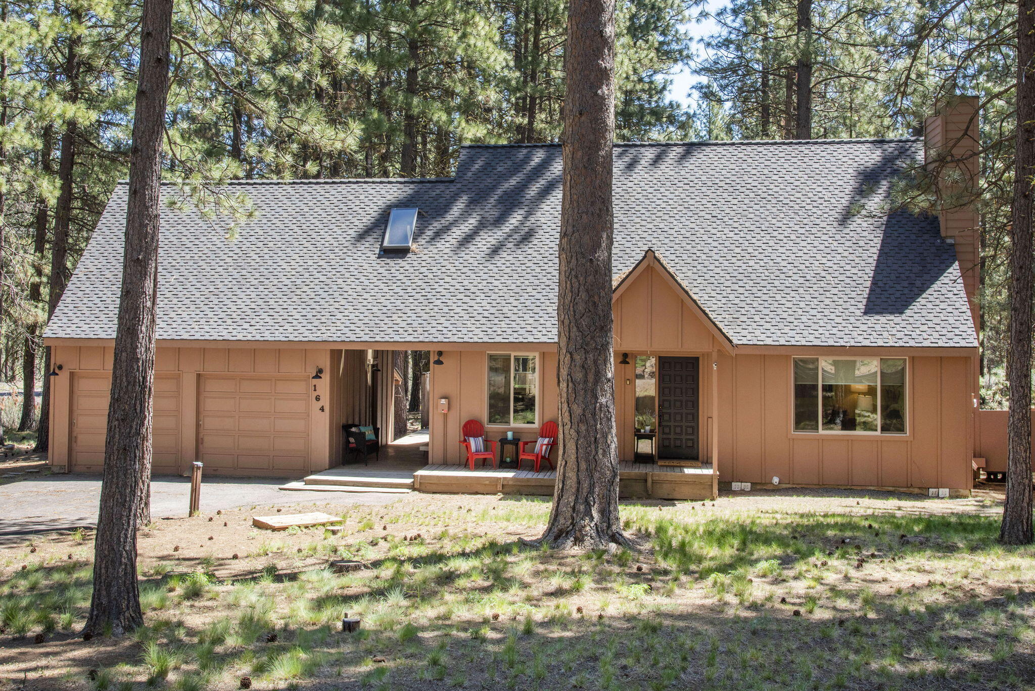 Well-maintained Black Butte Ranch home on a private half-acre lot backing to National Forest land. This classic retreat blends original BBR charm with thoughtful updates throughout. The fully equipped, remodeled kitchen and  bathrooms feature quartz countertops and white shaker cabinets. A newer heat pump, cozy wood stove, and central AC provide year-round comfort. A 50-year presidential roof was  installed in 2024. The oversized two-car garage offers plenty of space for vehicles and outdoor gear. Ideally located near the Glaze Meadow Rec Center with indoor/outdoor pools, spa, fitness center, and golf. Additional resort amenities include 18 miles of bike paths, tennis and pickleball courts, horse stables, restaurants, and two championship golf courses. Just over two hours from Portland and a short drive to Sisters, Hoodoo Ski Area, and Black Butte hiking trails. A turnkey retreat located in one of Central Oregon's most sought-after communities.