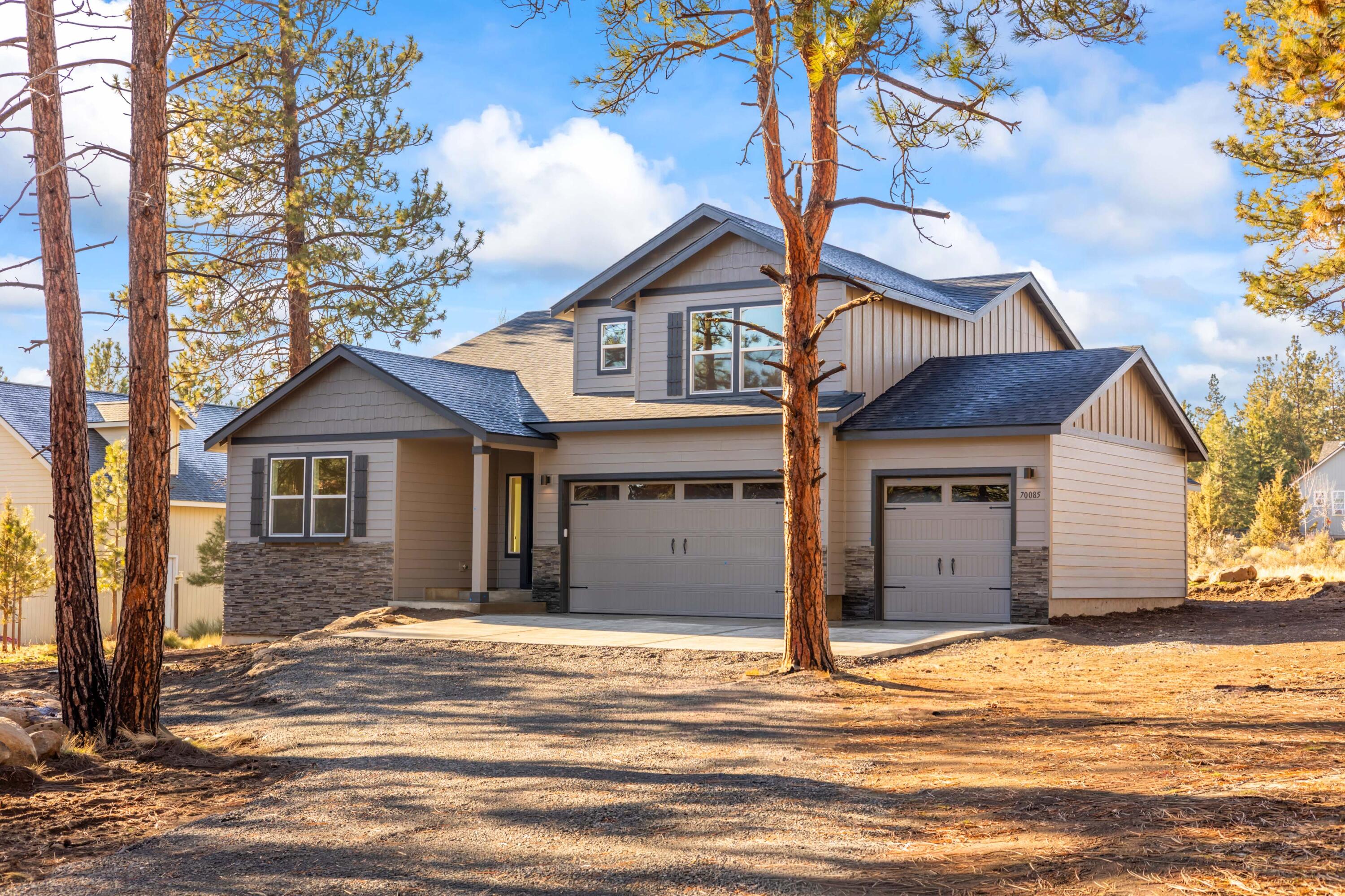 Located minutes from downtown Sisters with easy access to top recreation, this brand new home offers flexible living in a quiet Sisters setting with .96 acres of land. The floor plan is ideal for entertaining, featuring an expansive kitchen with quartz countertops, a large pantry, a generous island, open living & dining areas, and a cosy gas fireplace to create an inviting atmosphere. A built-in beverage center adds a perfect hosting touch. The private main-level suite includes a deluxe ensuite with dual vanity, tiled shower, and an oversized walk-in closet. Total of 4 bedrooms plus an exclusive bonus room above the 3-car garage—ideal for a media room, office, or gym. Nearby recreation options include the Peterson Ridge Trail System for hiking and biking, Suttle Lake and the Metolius River for fishing and paddling, and Hoodoo Ski Area for your favorite winter sports. Enjoy the space, comfort, and Central Oregon lifestyle this new construction home delivers.