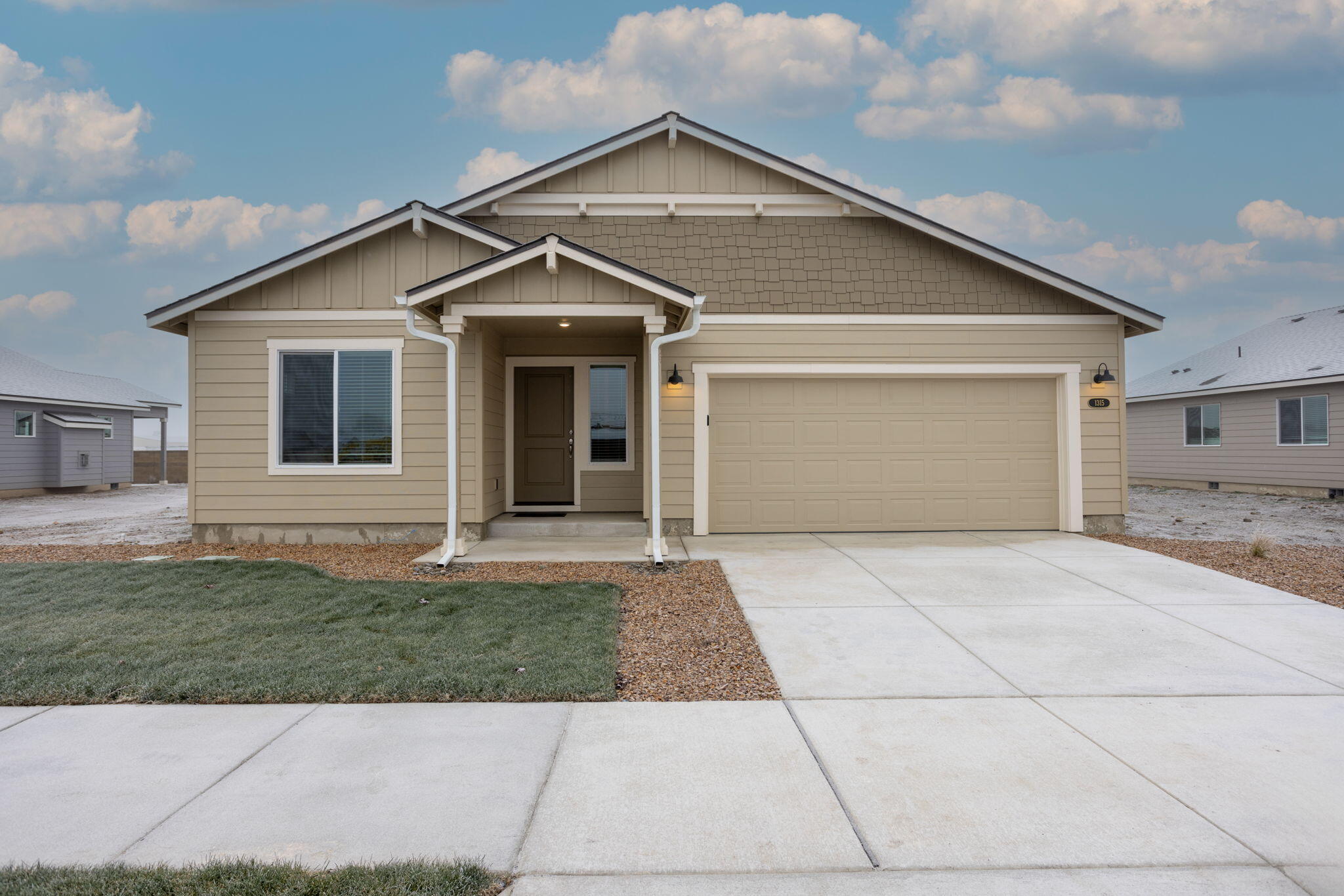 Fantastic, singlel level Sycamore plan will surely delight. Featuring a Vaulted chef's kitchen with quartz counters, large pantry, entertaining island, and 5 burner stainless air-fry convection range. Enjoy a spacious open concept Great room/Dining area with gas, stone fireplace perfect for entertaining. The Primary bedroom with coffered ceiling and bath with double sinks, shower and large walk-in closet. 95% high efficiency gas heating,    
A/C, fully landscaped and covered rear yard patio where you'll find peek-a-boo mountain views too! Ask about the builder $10,000 incentive.