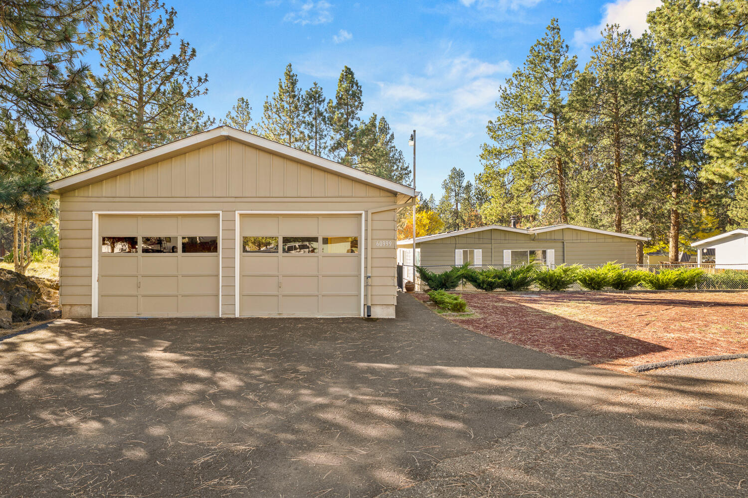 Discover exceptional space and versatility on this rare .57-acre property! This well-designed home offers 2 bedrooms, 2 bathrooms, and two dedicated office spaces—perfect for remote work, hobbies, or guest overflow. The open floor plan creates an easy, comfortable flow, while the outside Trex deck invites outdoor living and entertaining. The primary suite includes a generous walk-in closet, and the home is fully handicap accessible throughout for added convenience. Outside, you'll find a detached 2-car garage with workshop space, plus RV parking complete with hookups. With room to spread out and amenities that fit a wide range of lifestyles, this property is a standout opportunity. A truly exceptional value in a sought-after SW Bend location!