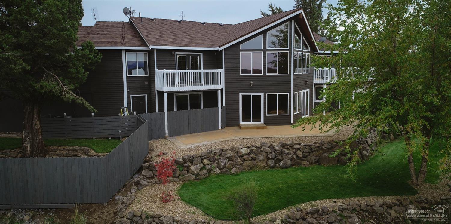 Great opportunity to own a beautifully remodeled 3,812sq ft custom home w/amazing panoramic views elevated high at back of property overlooking the Cascade Mtns & Smith Rock, over 20 private low maintenance acres backing countless miles of BLM trails, 2,880sq multi use barn, shop, 4H Building with new HVAC system, floor drains & private septic. Home has mstr on main level w/private deck, 3 car garage, 2nd shop by house, new roof, vaulted tongue & grove ceiling, new SS appls, granite, quartz & concrete counters, newer paint in & out, beautiful hardwood, concrete, tile, & carpet floors, new radiant floor heating system, huge great rm downstairs w/bar & kitchen, concrete driveway, immaculate landscaping, showpiece water feature, custom archway entrance. Deschutes River just 2 miles away & close to Eagle Crest's amenities!