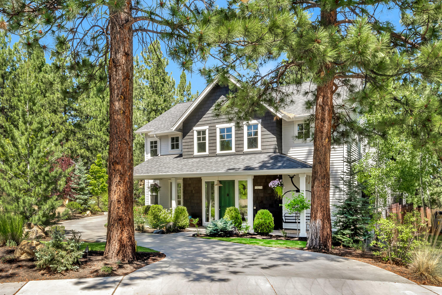 One of a kind property offers thoughtful details throughout this enchanting Westside sanctuary on a flat .52 acre in Shevlin Ridge. Light filled 2 story entry flows to open living space with farmhouse finishes & modern amenities. Dutch doors, brick accents, aged hardwood floors, quartz counters & abundant custom cabinetry create an inviting & efficient space. Kitchen features built-in window seats, island w/eating bar & 6 burner gas range. Adjacent flex rm for dining, library, studio? Unique details continue upstairs w/clerestory hall windows, vaulted bunk-style rm w/hanging beds & loft, office area, laundry w/folding tables, sink & built in cab's. Master w/dual head tile shower, walk-in closet & separate sinks.  2nd ensuite bedrm, 745 sq. ft. vaulted bonus (could be converted to add'l beds}, complete 2nd floor. Courtyard, 3 car, extra deep gar. & 597 sq.ft. ADU/cottage w/loft, surround a large, flat lawn w/treehouse & secluded patio firepit. Countless design gems await you!