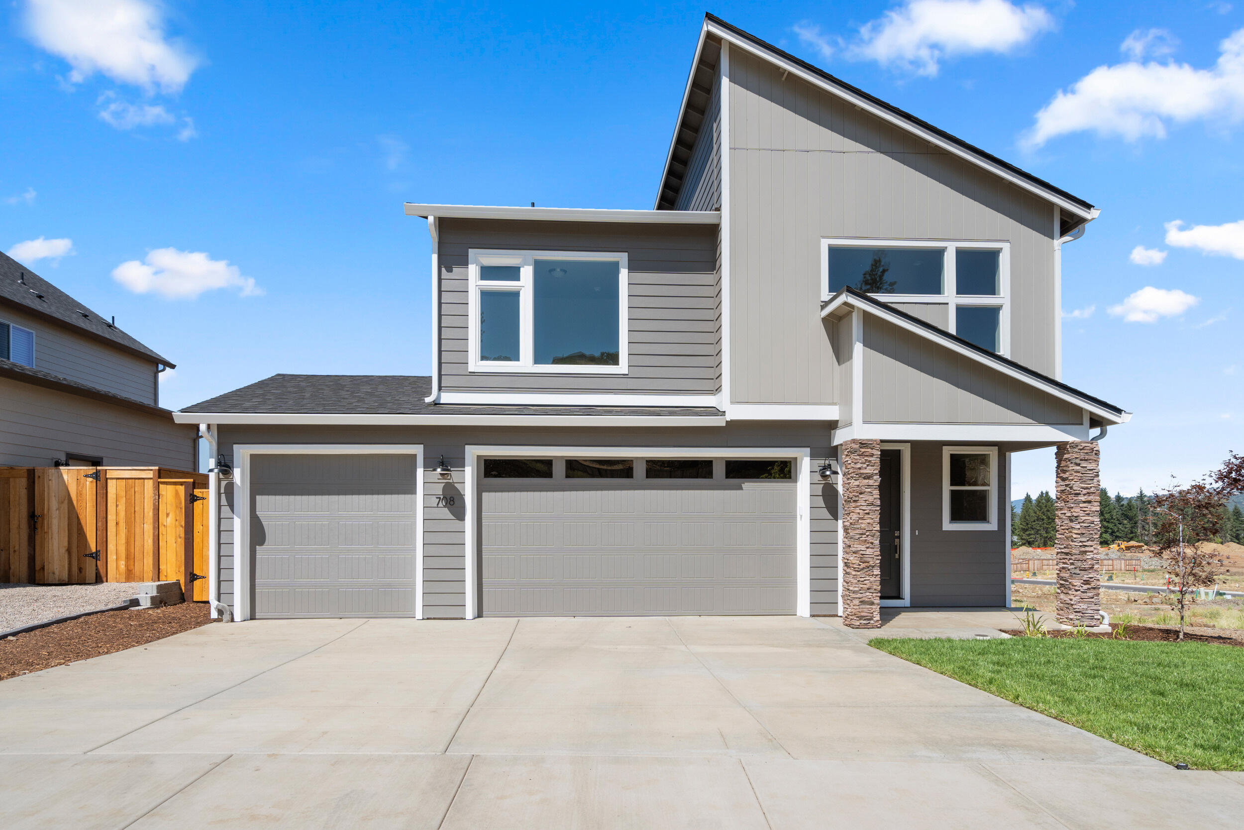 FINANCING INCENTIVES AVAILABLE! Move-in ready and full of style, this spacious 3 bedroom + a loft, 2.5 bath home is located in Quail Run—a picturesque community overlooking the Eagle Point Golf Course, with stunning views of the Table Rocks and surrounding mountains. Thoughtfully designed across two levels, this home features a generous kitchen with ample counter space, a large island, and a walk-in pantry. The heart of the home is the light-filled great room, where tall windows frame the natural beauty outside, and the gas fireplace adds warmth and charm inside. A slider door to the covered deck connects the indoor living space to a welcoming outdoor area, perfect for year-round enjoyment. Located in a scenic, well-maintained neighborhood, this home is ready to welcome you—Schedule your private tour today!