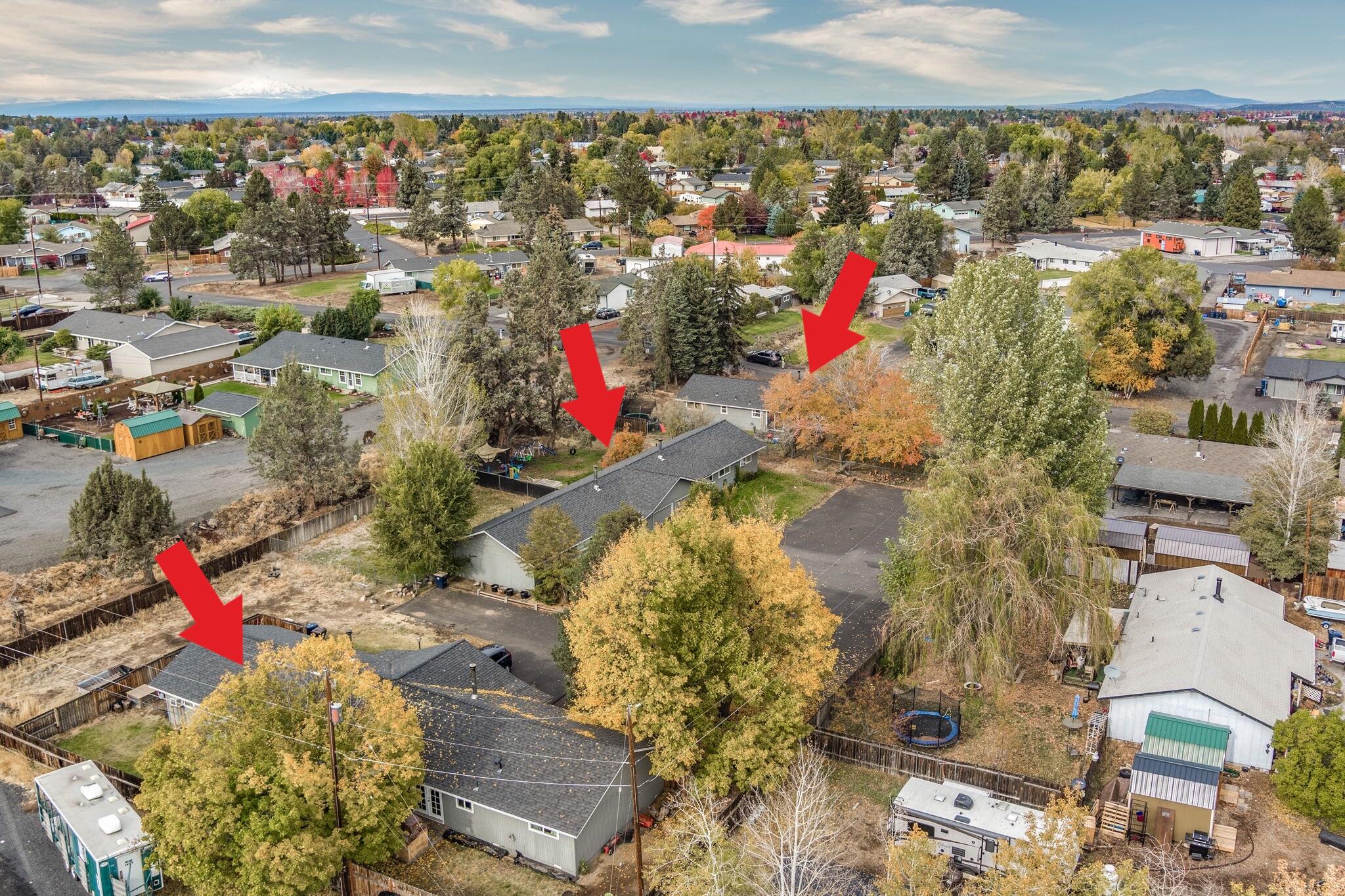 Fully rented turn-key opportunity in the growing community of Redmond! Potential to further increase density with additional doors, this offering includes three duplexes with established tenants in all six units. Two of the duplexes offer 3 bedrooms & 1 bathroom units with washer/dryer hookups (tenant owned washer/dryers & other appliances are included). One duplex has two units that have 2 bedrooms & 1 bath per side. Owner currently pays water/sewer/garbage for the complex. Tenants are responsible for landscaping. Each unit has a one car garage. RV Parking available on site as well. Only a short distance to downtown Redmond, grocery stores, & other amenities w/ easy access to HWY 97 & Redmond Airport.