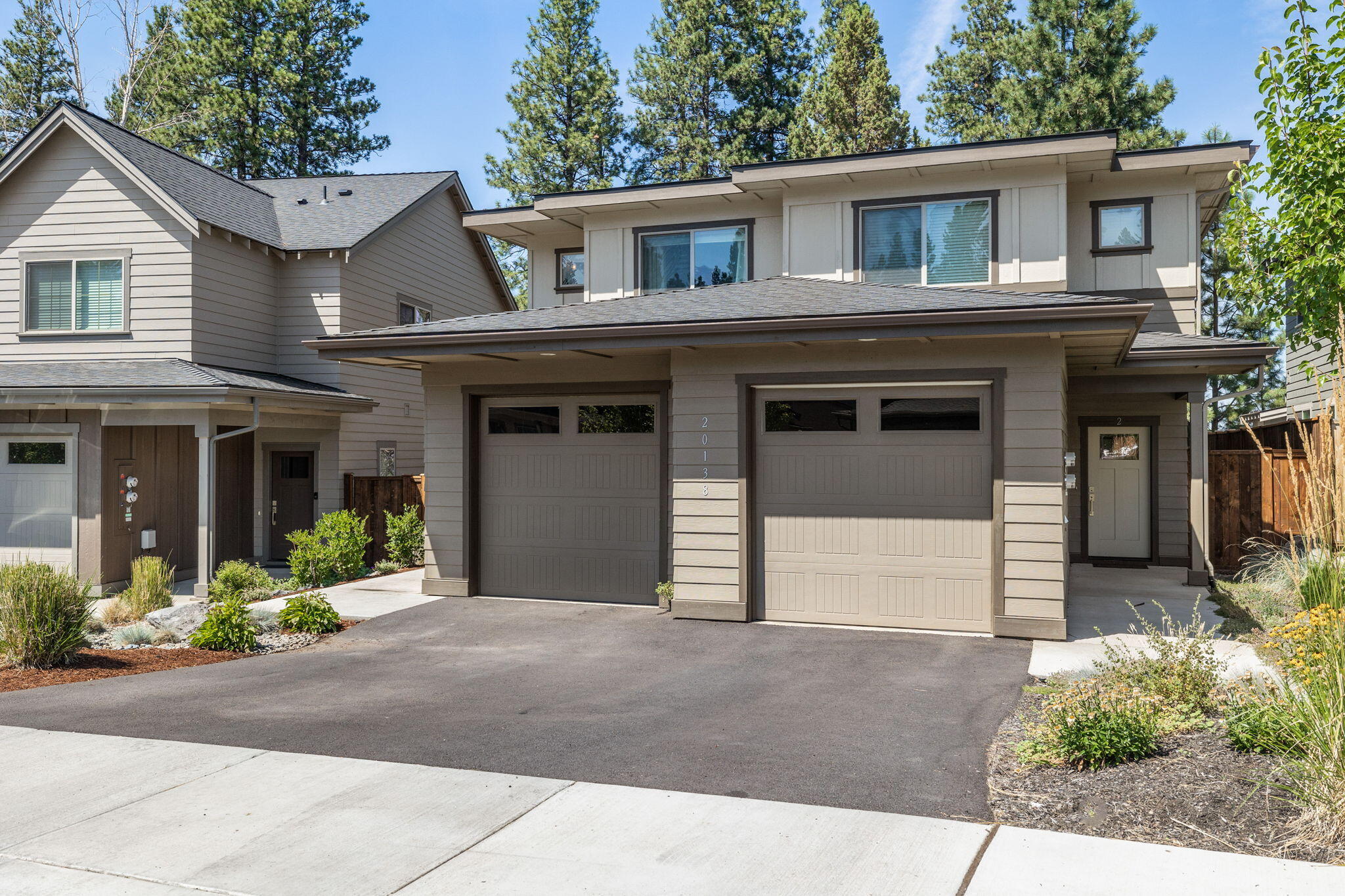 This duplex features 3 bedrooms and 2½ baths per side over looking the canal. Upgraded finishes throughout the home include: Quartz counter tops, back splash, stainless steel refrigerator & dishwasher, waterproof plank flooring, gas fireplaces and high efficiency ductless heat pumps with air conditioning. The fenced yards features a concrete patio area, enclosed storage, landscaping in front and hardscaping in the backyard. Attached garages with automatic openers. Great turn key investment opportunity with professional property management available. Contact for performa.