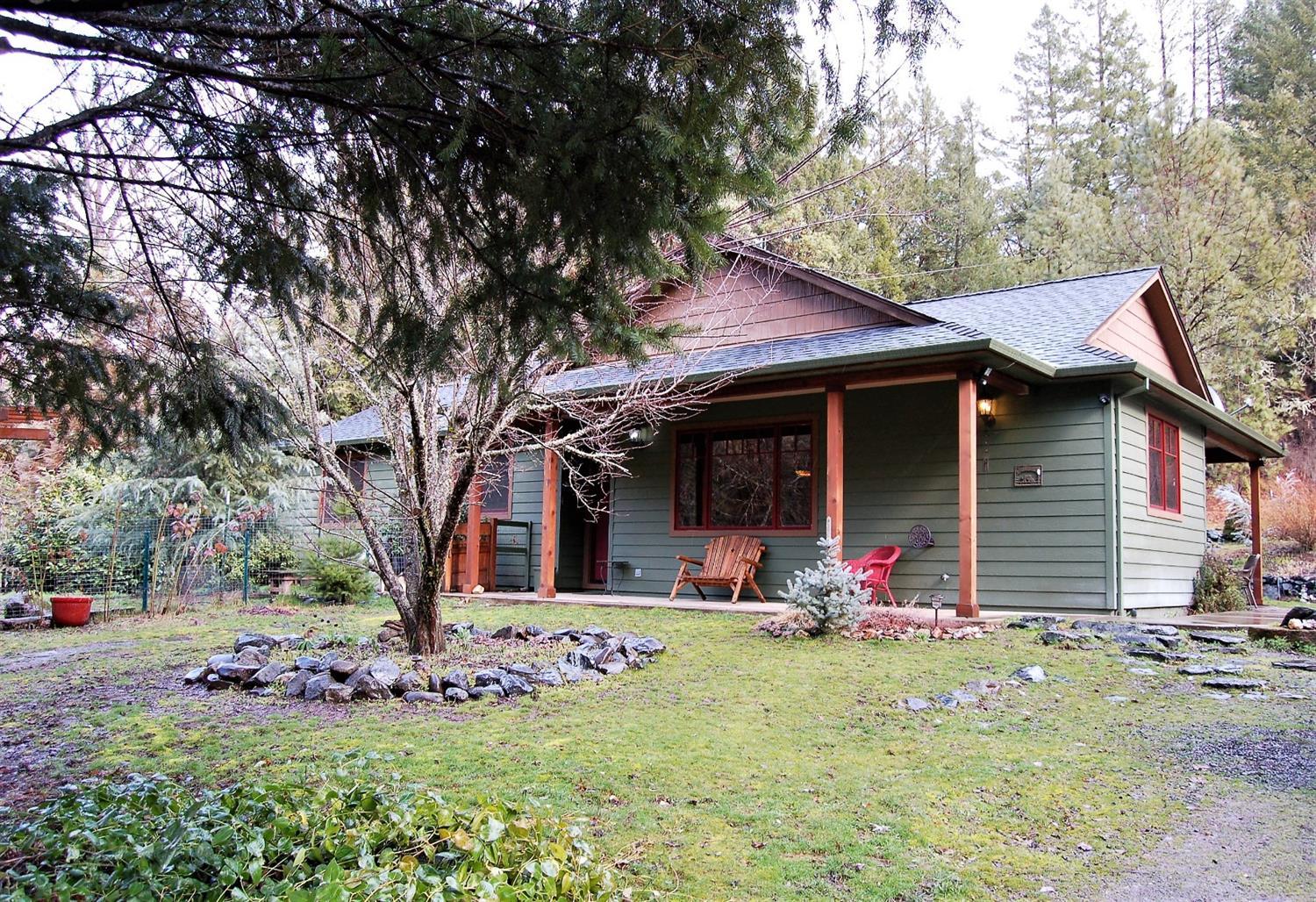 Welcome to the Oregon Dream Property! Here's the home you've always wanted, but rarely comes available. This wonderful 3 bedroom with 2 full baths is located on almost 5 acres with Sardine Creek frontage and is guarded by majestic pines and beautiful evergreens with total privacy. As you enter this amazing custom home you will notice a beautiful, vaulted cedar ceiling, open family room and cozy wood burning stove. The kitchen offers plenty of storage, beautiful granite counter tops and windows looking out over your property. Both bathrooms have double vanities with travertine tile floors, new faucets and fixtures. The seller updated the electrical to the well in 2012, new pressure tank, booster pump and well casing. There is also a small shop/barn, storage shed and dry storage area. If you want privacy, a custom built home to just enjoy watching the creek flow or listening to the wind blow in the trees you have found it!