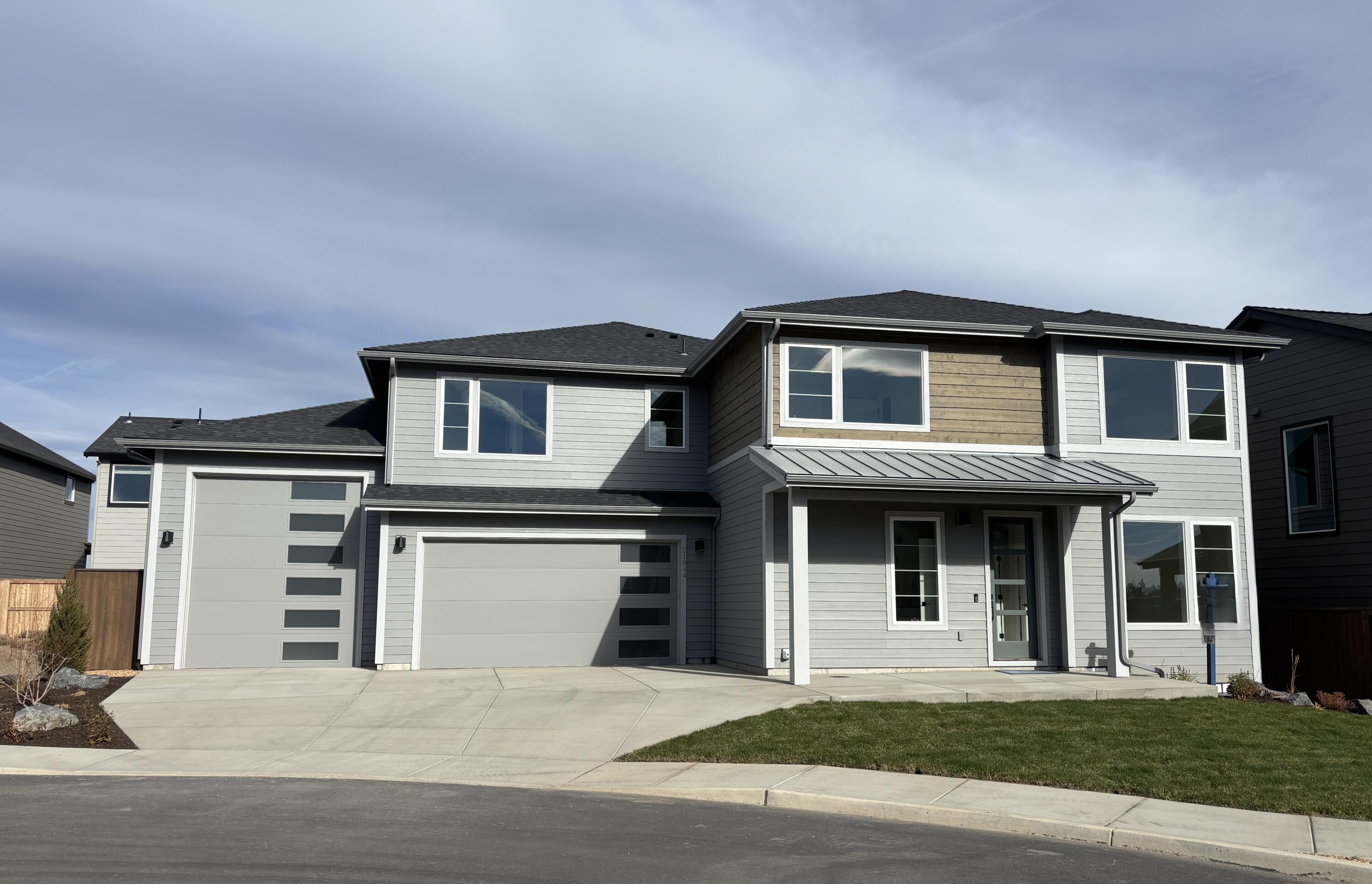 Welcome to this fabulous home, which features an RV garage, a 2-car garage!
It also has a large covered patio, and open-concept living with an 0ffice/bedroom and a full bathroom on the main floor.  Upstairs you will find 4 additional bedrooms, including a sizeable primary suite with a large walk-in closet and generous floor-to-ceiling tiled shower. There is also a large loft/bonus area and a full laundry room with a sink and cabinets for storage.  All of the homes Stone Bridge Homes NW built are Earth Advantage certified and include a landscaped front and back yard, fencing, a Ring doorbell, a Nest thermostat, a 220-volt plug for an electric car, and air conditioning. You have everything you need to make it the perfect home.

Stevens Ranch features parks, caves, walking paths, nearby shopping and restaurants, and the new Bend library