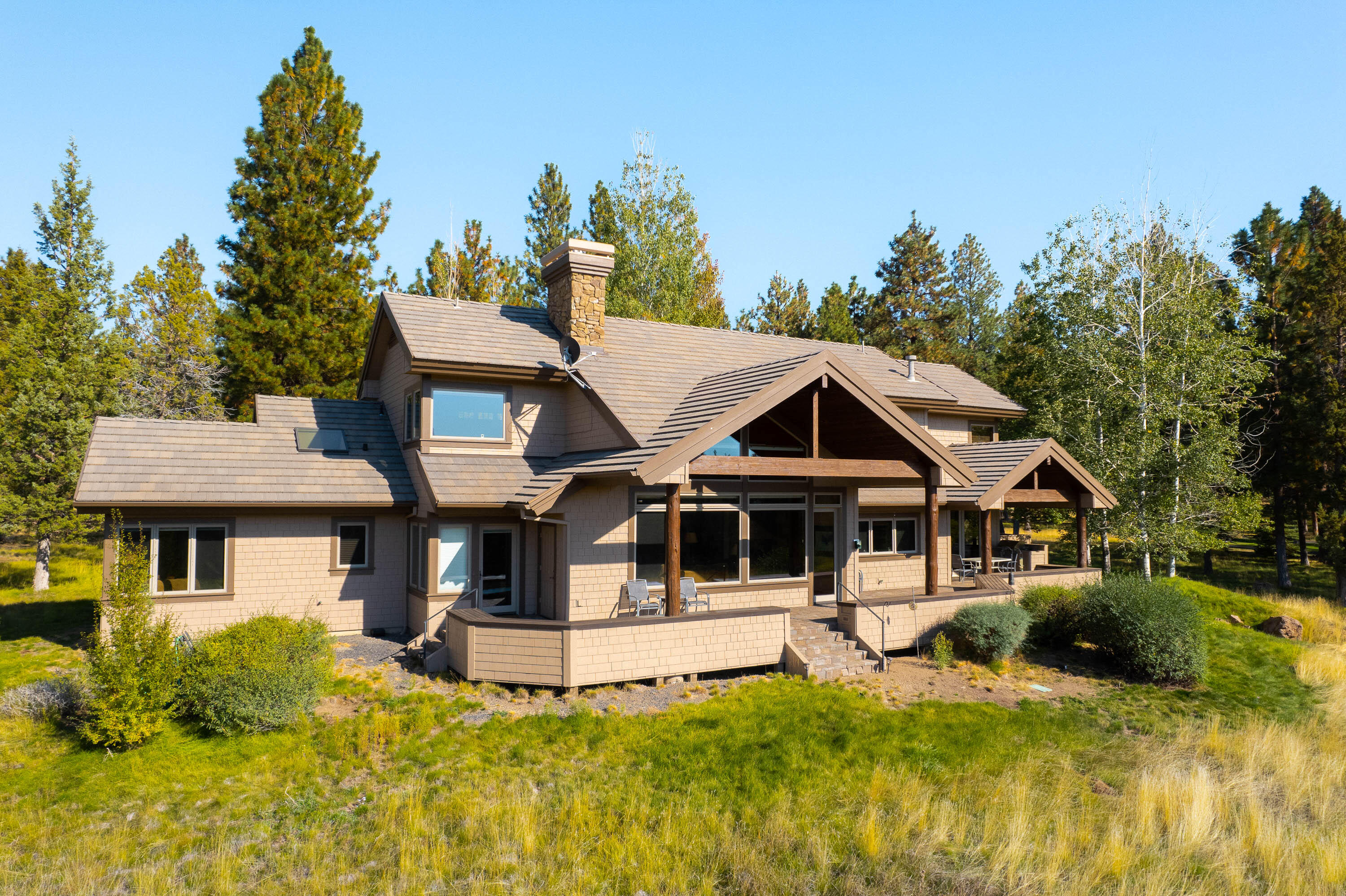 Located in a hidden gem of Sisters, Cascade Meadow Ranch is a serene gated community surrounded by US Forest Service Land Known for the equestrian facilities & more. This stunning custom home is your own peaceful getaway. Specifically designed to incorporate the unobstructed views of the Cascade Mountains from every room in the home. Inside you'll find custom alder cabinets and beams throughout with metal accents including the custom fireplace cover made by the local Ponderosa Forge. The oversized kitchen features high end appliances and opens  to the vaulted great room where you cozy up in front of the stone fireplace. Upstairs is the spacious master suite where you can relax in the jacuzzi tub or on the bay window seat by the fireplace. The oversized double car garage is heated and has ample room for storage w/ an additional storage room. You'll appreciate the attention to detail & the fireproof siding & roofing. Don't miss your opportunity to live in this sought after community.