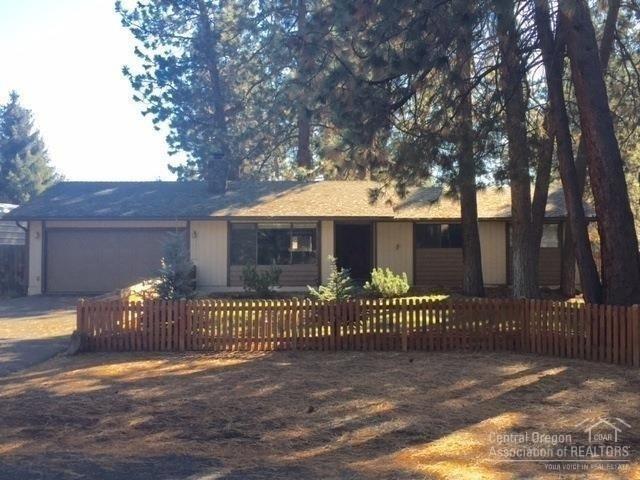 Wanting a spacious private half acre lot? or single level living? The search is over! Large living room with fireplace that can be switched to gas. Extra back room can be used as a fourth bedroom, playroom, or home office. New glass slider leads to the best backyard ever! Plenty of room for entertaining, lawn games, or build your dream shop. And a bonus, little ones will thoroughly love the play structure. Mature landscaped property in a well established neighborhood. Call it home!