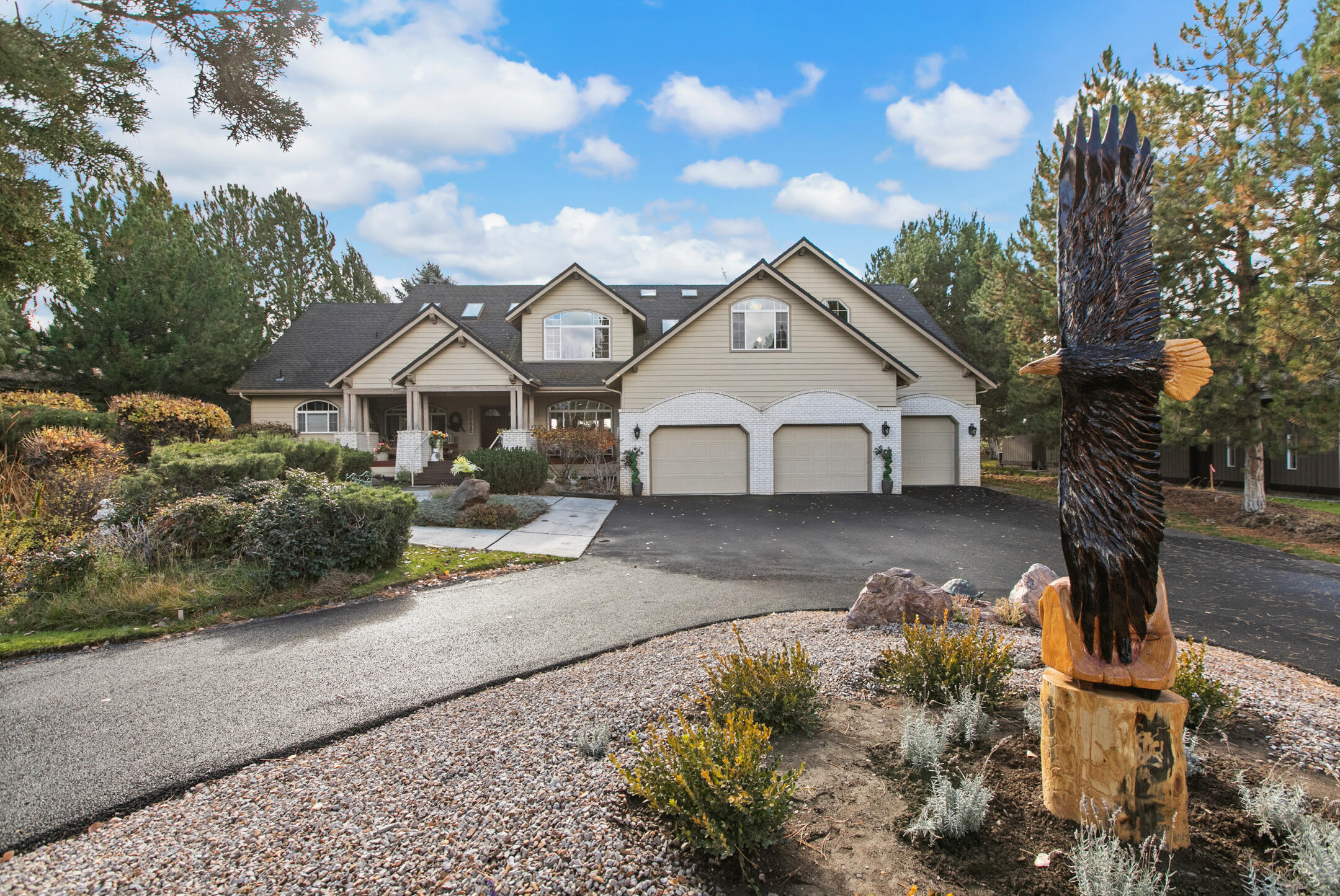 Custom home offered, in a private community, of Beautiful Eagle Crest Resort. This canyon drive offers privacy, views of the golf course, northerly mtn. views. Enjoy looking out towards the canyon and pond under your cedar covered front porch. Entertain on the back deck, serene views on the 4th fairway/wildlife. Landscaped .70 acre is a hidden oasis lush tree line. Newly added asphalt turn-around. Light/bright living space offers beautiful windows/skylights through-out the home. Vaulted cathedral ceilings accented with stunning wood beams. Master on the main includes a private sunroom & customized walk in closest. Additional en-suite on the main with soak tub. Upstairs offers a 3rd en-suite large tub/waterfall shower. Additional bedroom. Ample storage/large bonus room with pool table/wet bar/office space. Granite countertops Thermador CookTop, kitchen nook, formal dining room. Large 3 car garage. Eagle Crest Resort offers gym, pools/pickleball/trails/dining & more.
