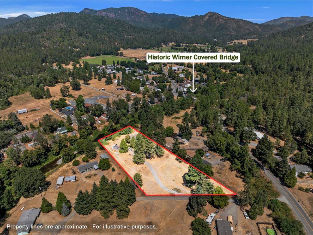 Affordable 3-bedroom, 1-bath home on 2.05 acres; property brings together land, water, and newly refreshed home !!... 

Enjoy year-round Evans Creek frontage plus transferable irrigation WATER RIGHTS from Evans Creek— a rare and valuable asset for gardening, livestock, or your small-farm vision... 

1,008 sq ft Home is currently being renovated inside and out...  Acreage offers flat, usable pasture, a private well and septic, ample RV/boat parking, room to expand, and even your own Creekside Swimming Hole for summer fun.  A must-tour for anyone seeking land + water + turnkey updates!