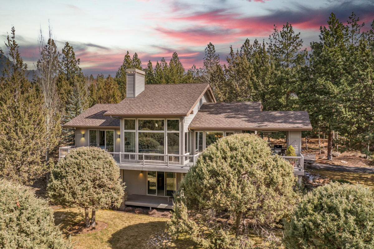 Picture yourself on this private corner in the heart of Bend with views of Mt. Bachelor and the Cascades. This home is truly made for both entertaining and everyday living, with plenty of space and fabulous views. Enjoy the open floor plan, high ceilings and centrally located kitchen, plenty of cabinets and a spacious pantry. Floor to ceiling windows. The heart of this home, the kitchen — with adjoining dining area and great room — make it ideal for gatherings. Spacious loft overlooking great room. The bedroom separation and additional en suite  is designed for guests or office space. Walk outside to your backyard oasis, a peaceful paradise with multiple decks and captivating views. Flat driveway. Generous garage with work bench, room for golf cart and all your Central Oregon toys. This property is immaculate, well-cared for, and ready for new owners. Welcome home!