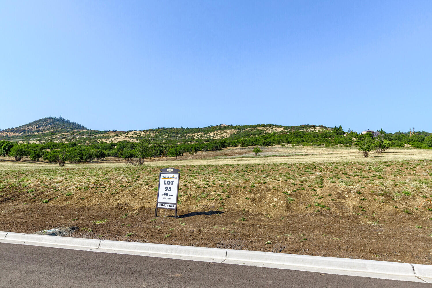 Incredible Valley and Mountain Views from this homesite.  Located in Saddle Ridge Phase 4.  Lot 95.  This (.49 acre) parcel is in a neighborhood of upscale homes located in East Medford with beautiful views of the valley.  This is not a build package.  You can purchase the lot and bring your own builder.  All building plans must be submitted to the architectural review committee for approval prior to the start of construction.  The listing agent is related to the seller.