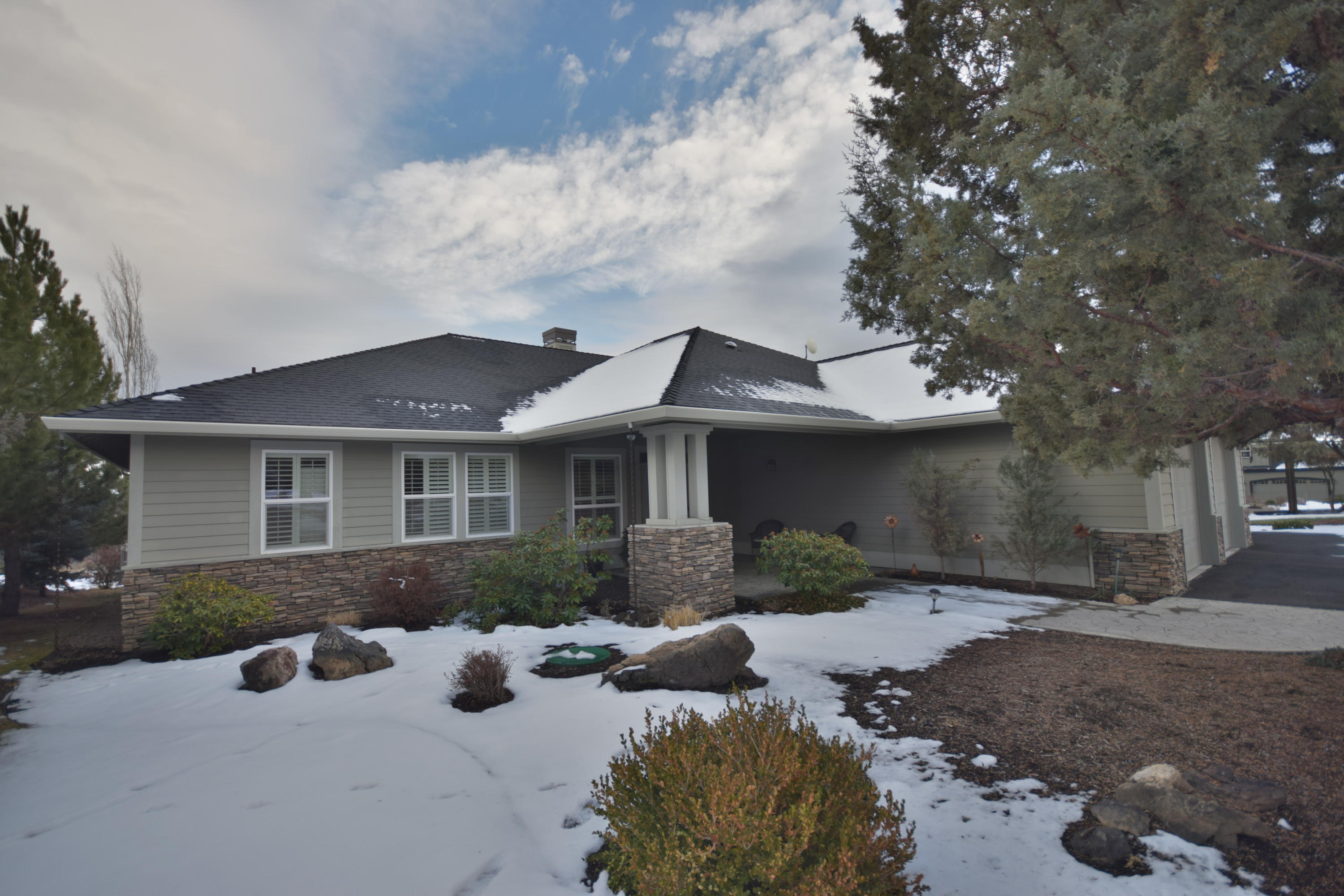 Great Opportunity to live the Central Oregon resort lifestyle. You will love this Eagle Crest Resort single story with a spacious 2,406 sq ft floorplan that boasts two master suites. Designed to enjoy the outdoors with expansive partially covered Trex deck and hot tub along with nice territorial views. A perfect place to enjoy the morning sun. Bring your toys ~ there is plenty of room in the oversized 3 car garage. Light & bright with an open floorplan this home also has a large home office with custom built-in desks. Low $107+/- monthly dues gives you and your guests access to the Resorts many pools, sports centers, walking/biking trails, indoor sports court and more! Start enjoying life and make this home yours today!
