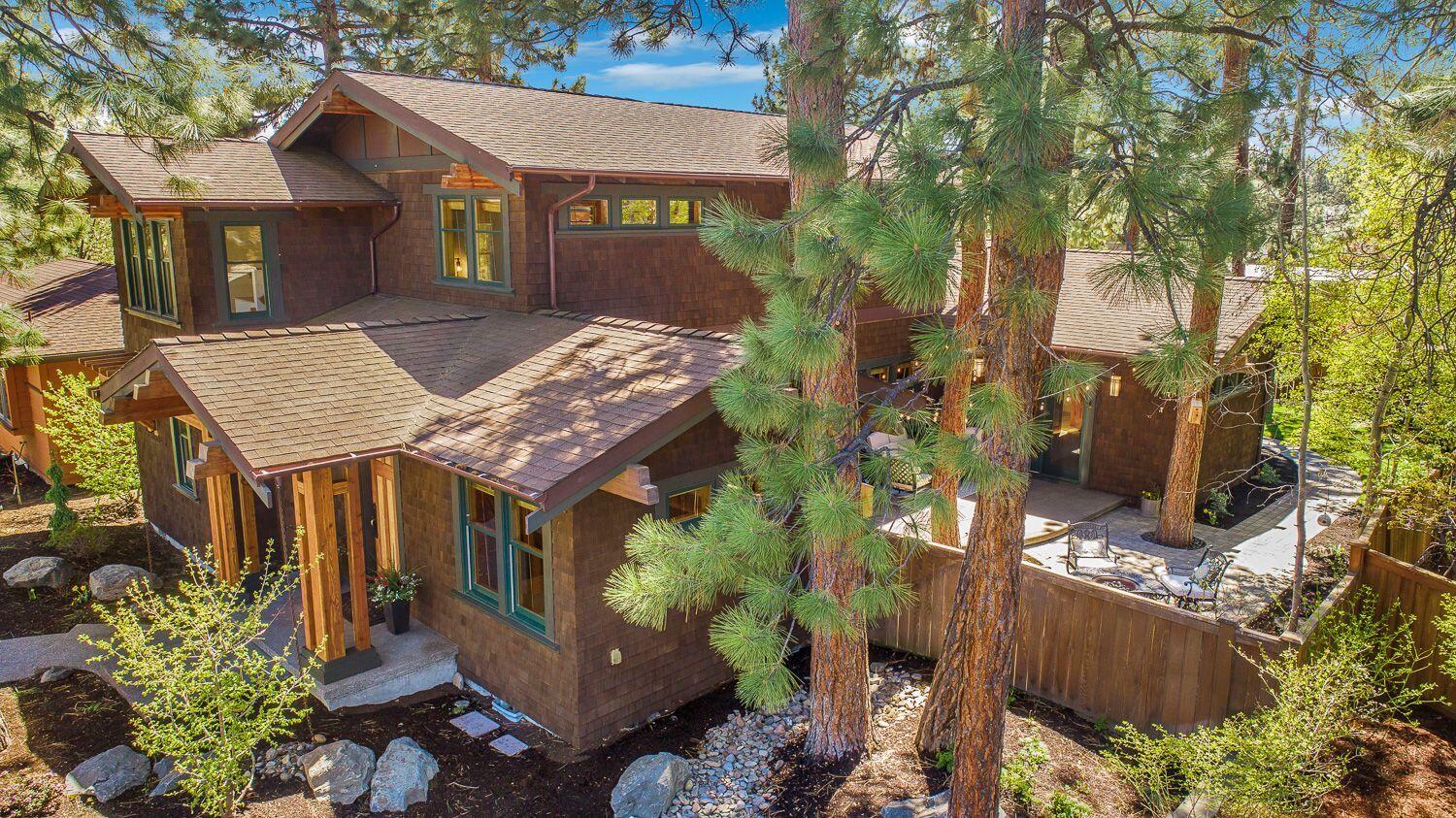 Fall in love with this beautiful 2,492 sf craftsman style home in one of the quietest corners of Northwest Crossing. Each of the three spacious bedrooms feature abundant natural light and walk in closets. You will find the 4th bedroom/office and Master on the main floor. The master bedroom opens to the peaceful outdoor patio while its bathroom boasts a tiled shower, heated floors and soaking tub.  Upstairs you will find 2 generous bedrooms, full bathroom, craft nook and bonus/TV area. Many updates throughout the home including a remodel of the upstairs bathroom, downstairs powder room, pantry and kitchen backsplash. Enjoy the fully fenced back yard with new landscaping and mature trees while also being just around the corner from the 5 acre Compass Park. In true craftsman style form, this home celebrates natural materials like cherry cabinets, red birch hardwood flooring and natural wood trim. Come make this beautiful house your home.